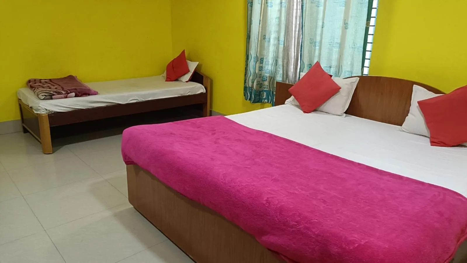 Bed in Hotel Tezpur City