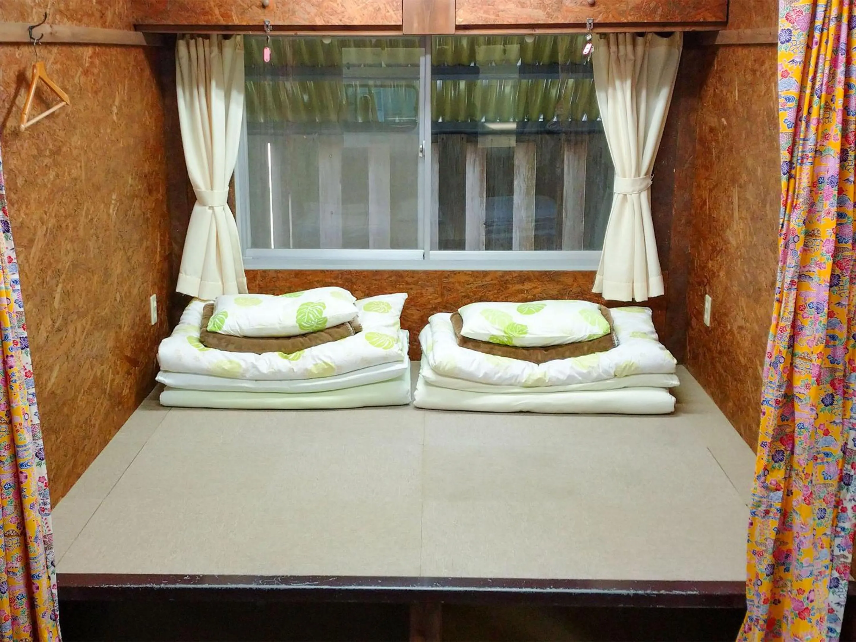 Photo of the whole room, Bed in Sesoko Island Guest House Kafuu Village