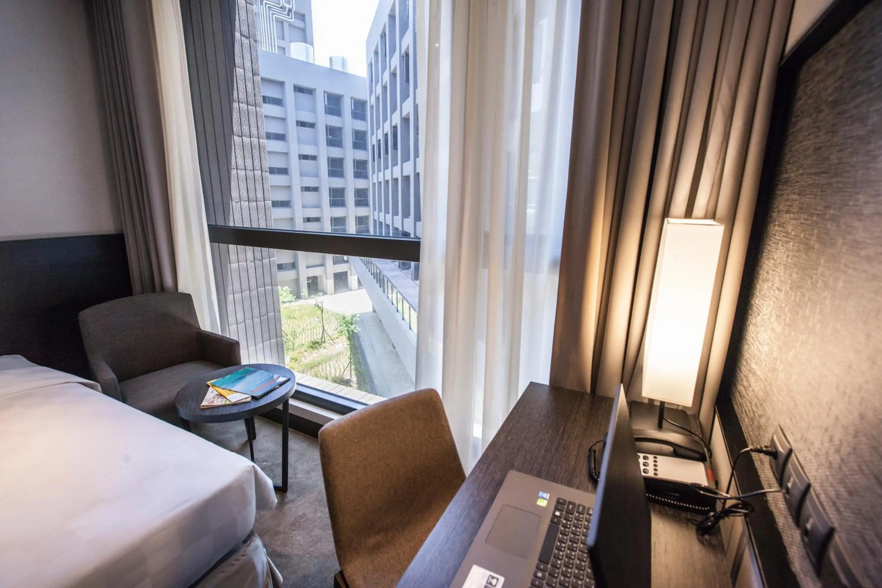 Inner courtyard view, Bed in Platinum Hotel