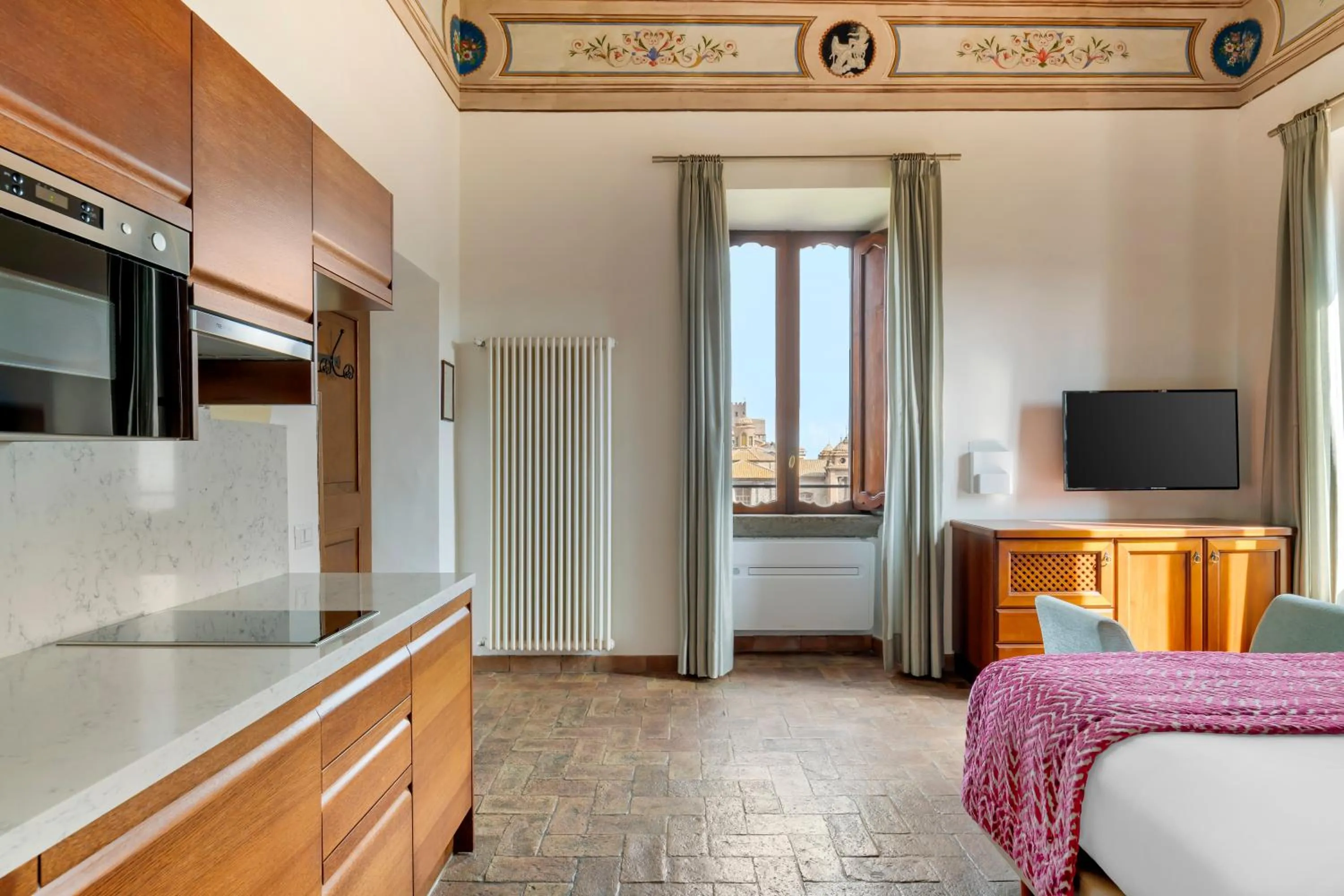 Kitchen or kitchenette, Bed in Palazzo Catalani Resort