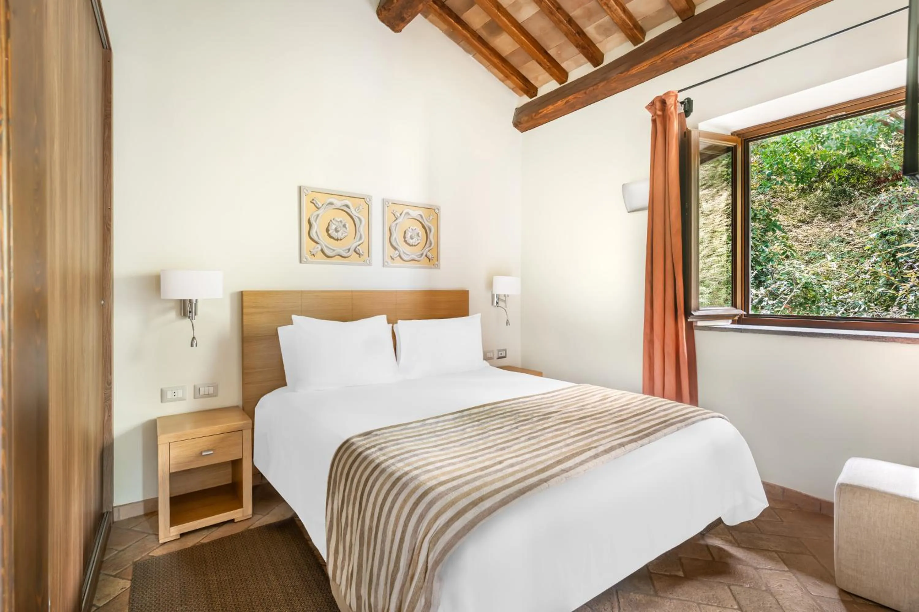 Bed in Palazzo Catalani Resort