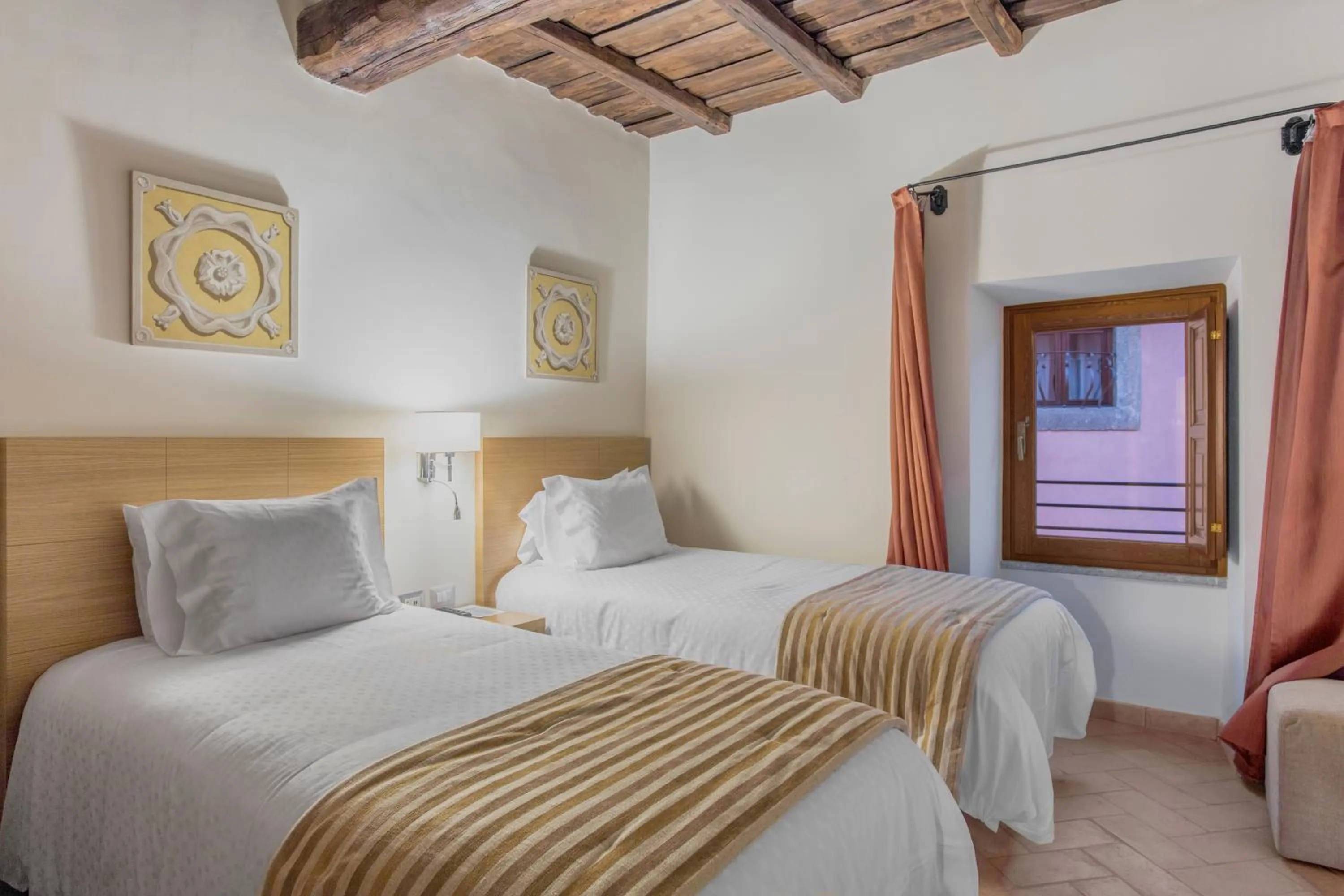 Bed in Palazzo Catalani Resort