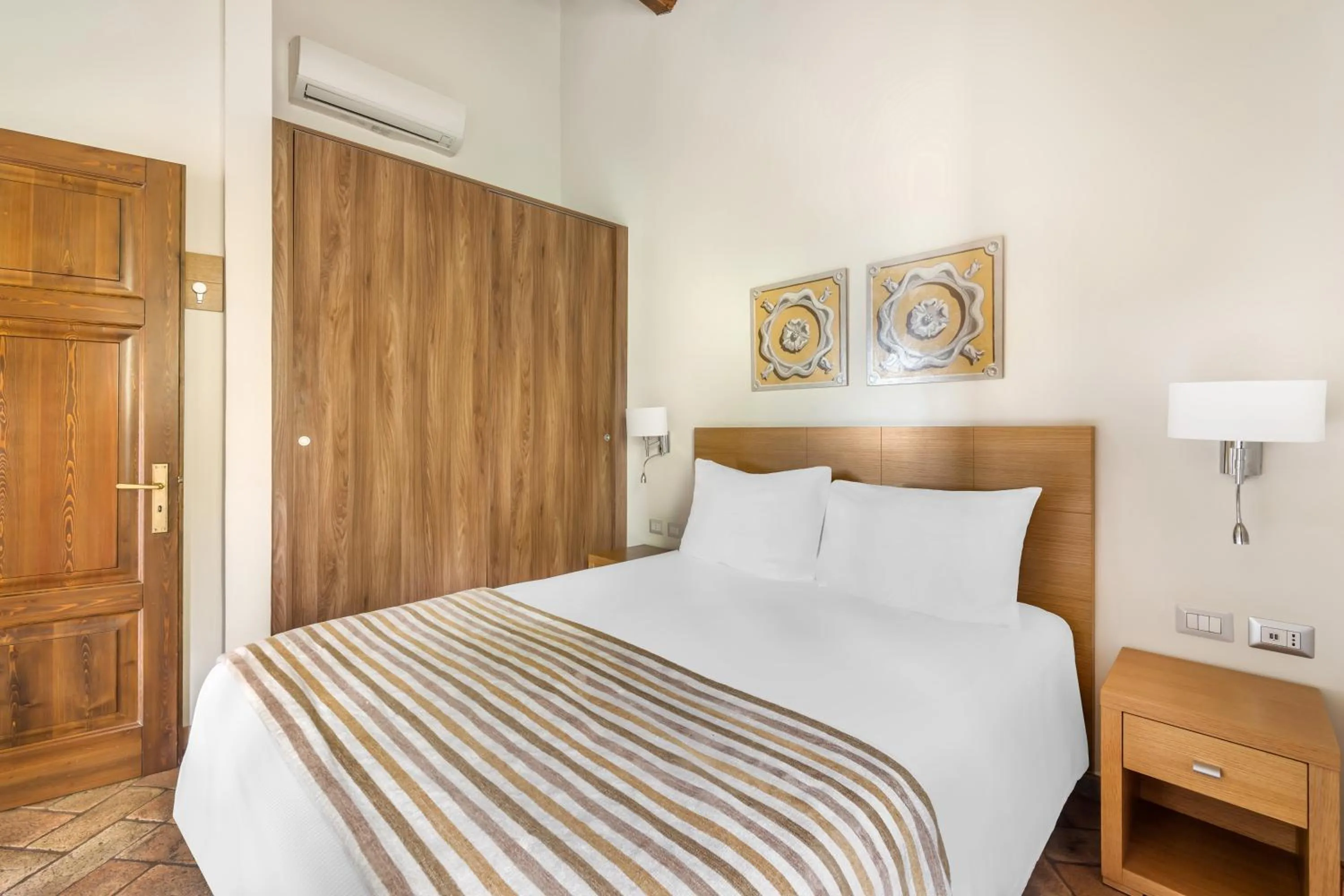 Bed in Palazzo Catalani Resort