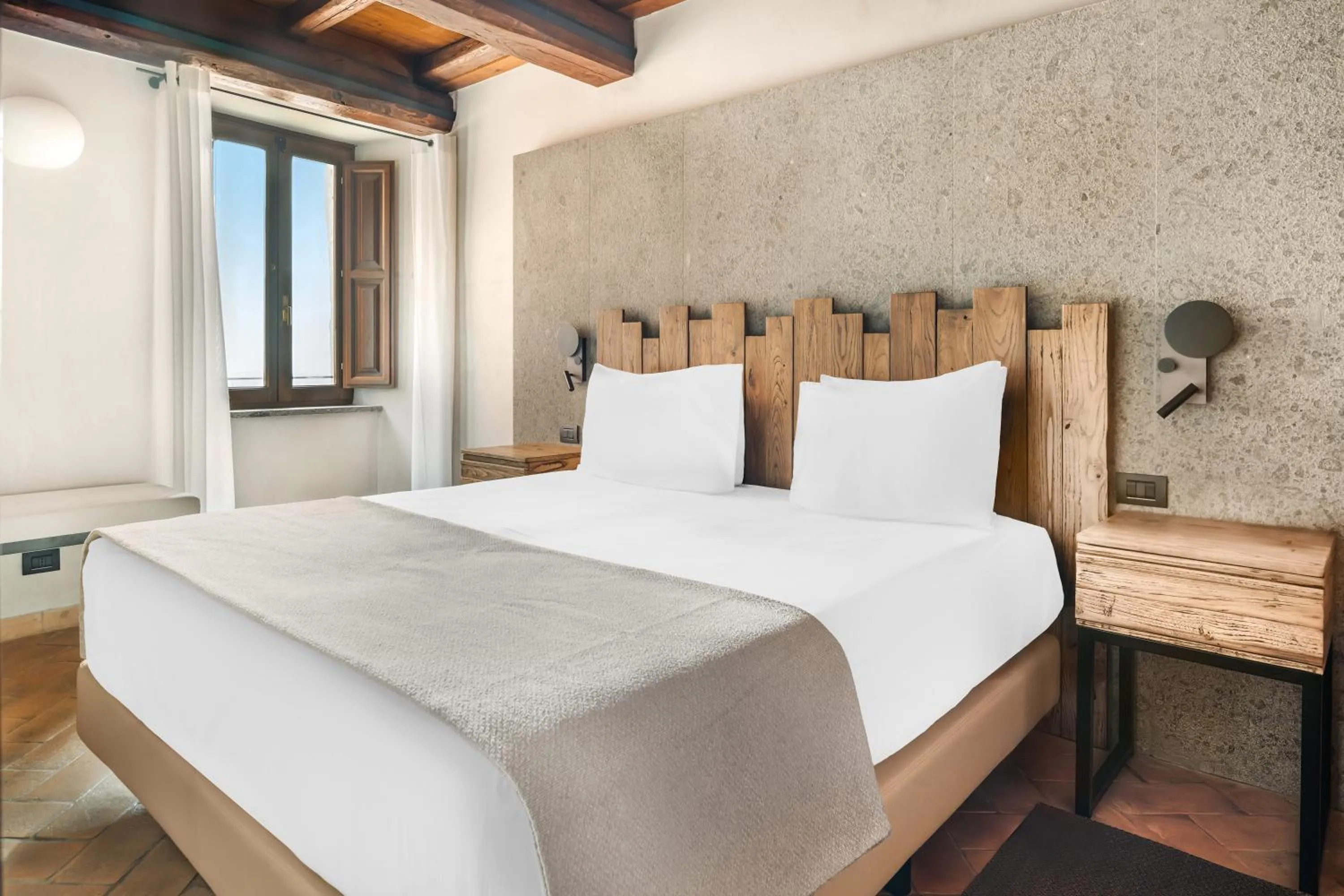 Bed in Palazzo Catalani Resort