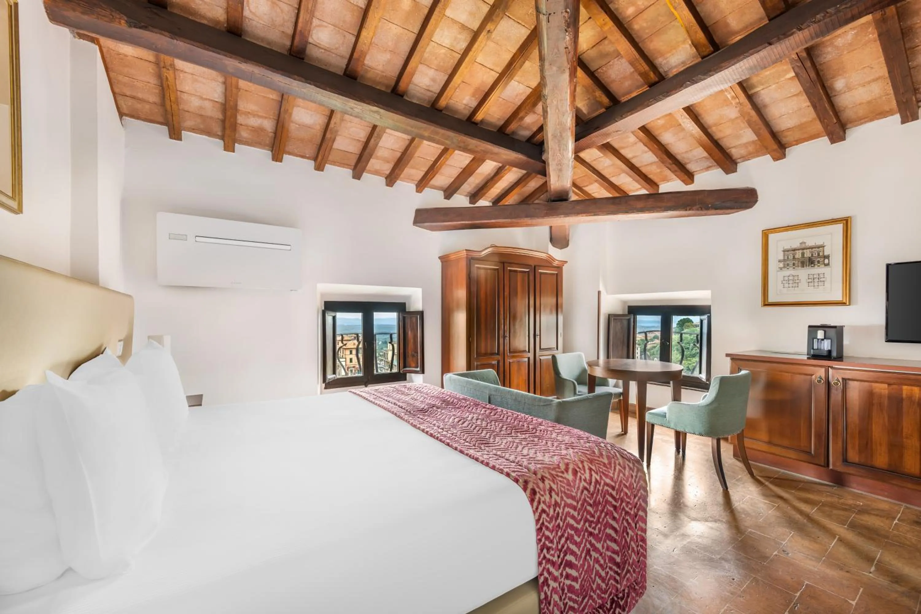 Bed in Palazzo Catalani Resort