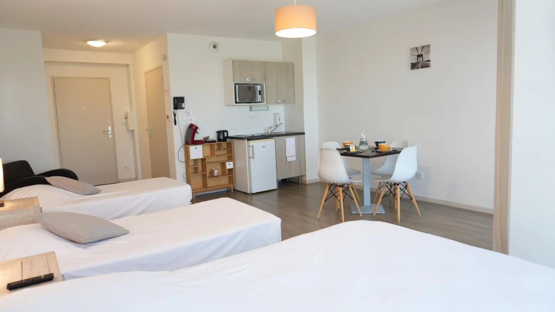 Bed in Zenao Appart'Hotel