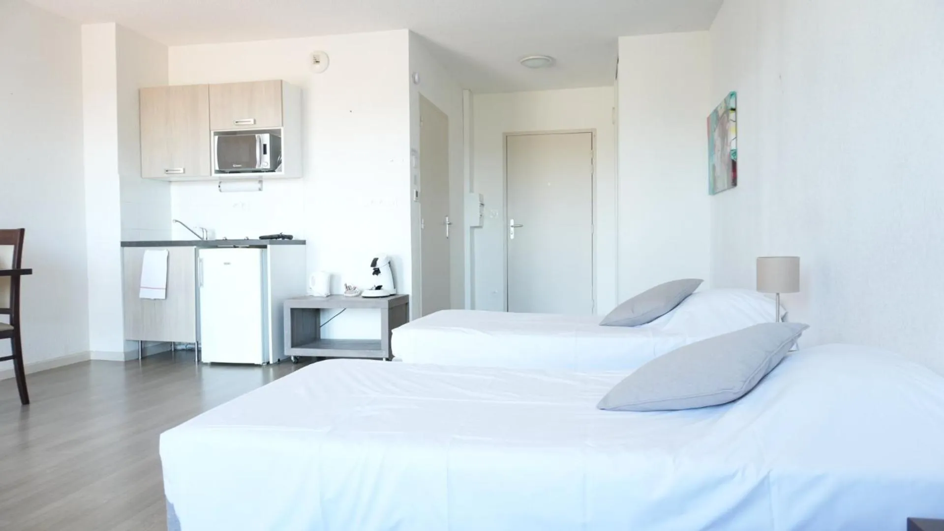 Bed in Zenao Appart'Hotel