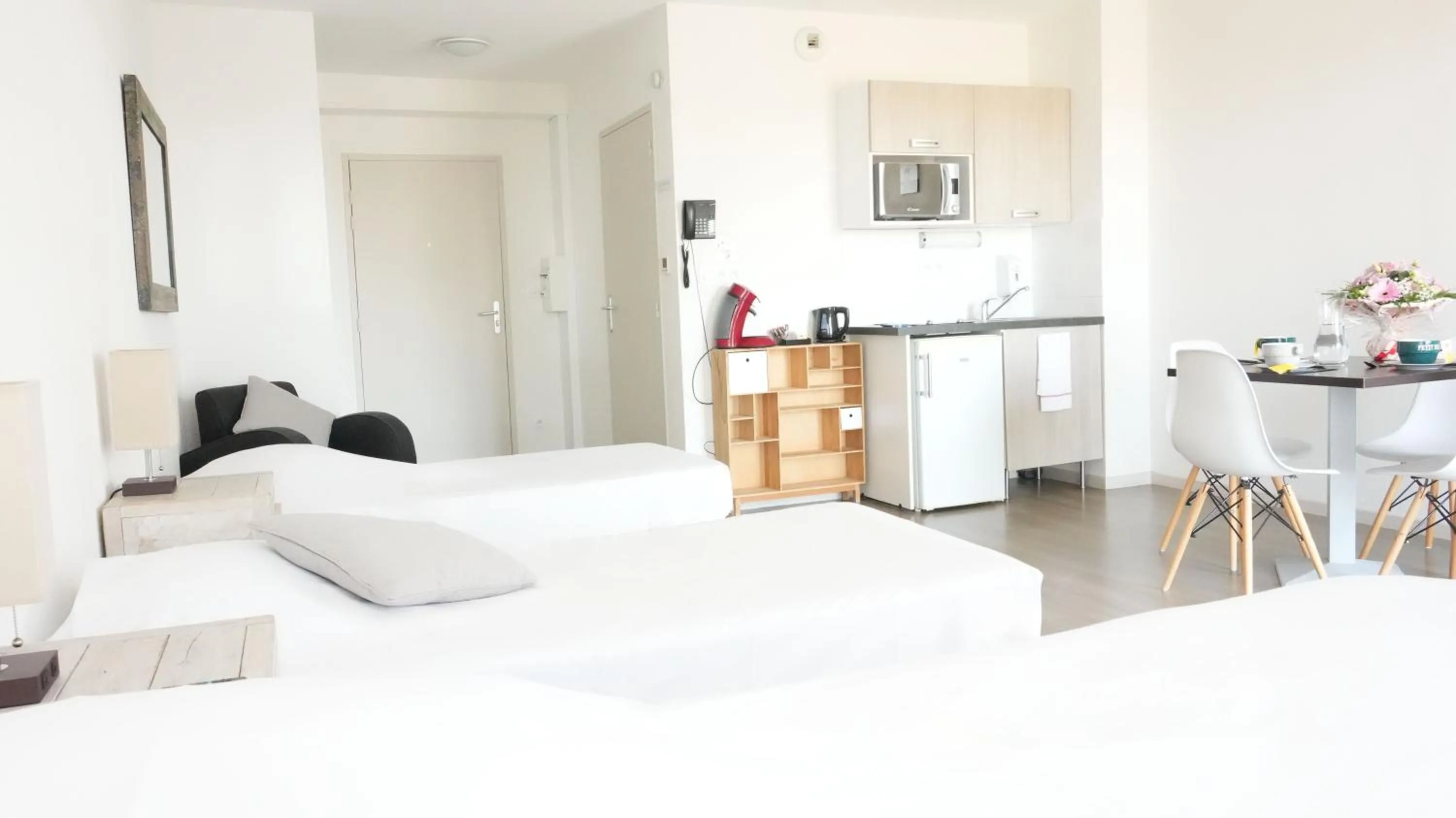 Bed in Zenao Appart'Hotel