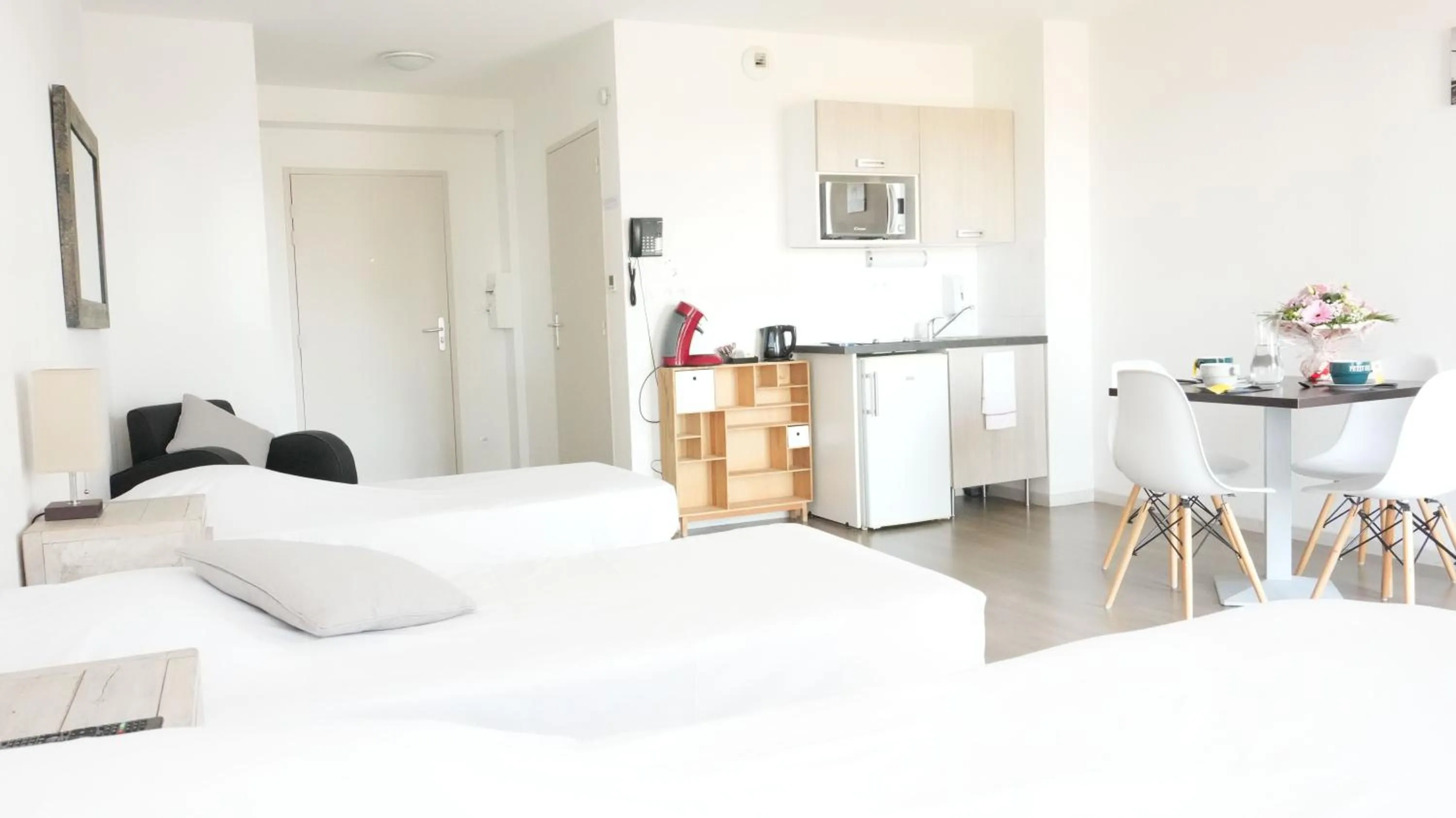 Bed in Zenao Appart'Hotel