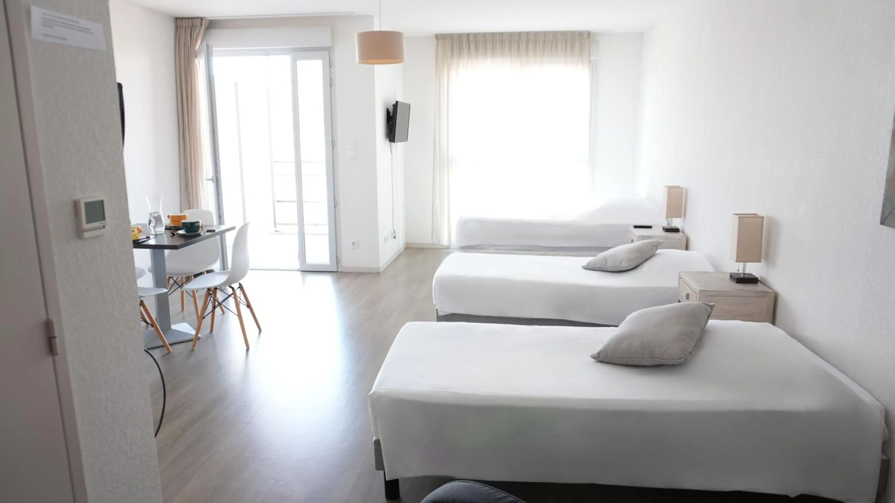 Bed in Zenao Appart'Hotel