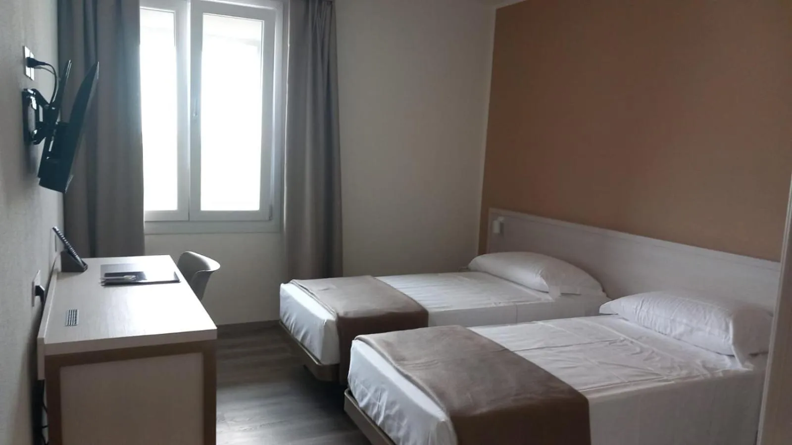 Bed in Hotel Donatello