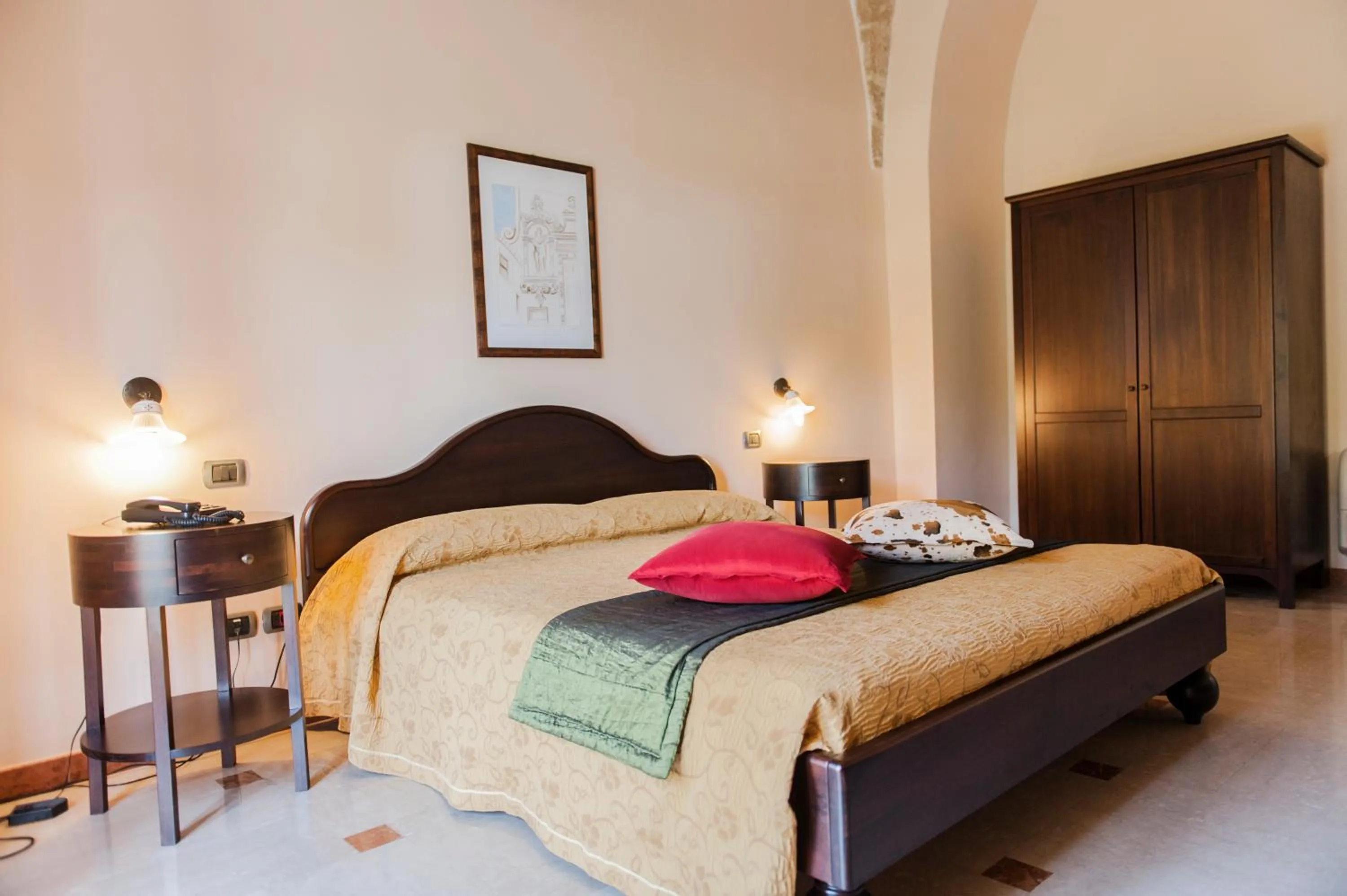 Bedroom in AmareGold Tenuta La Baronessa Resort