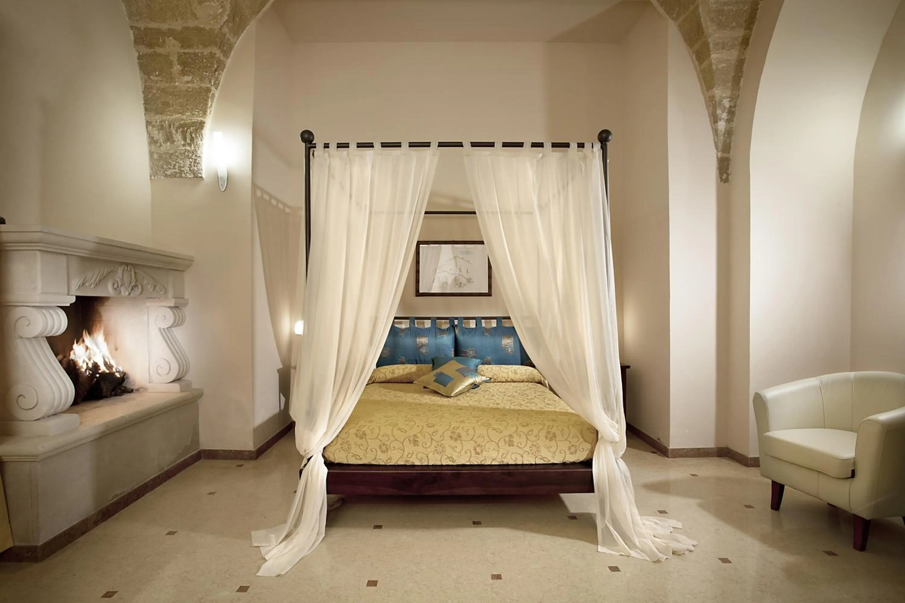 Bedroom in AmareGold Tenuta La Baronessa Resort