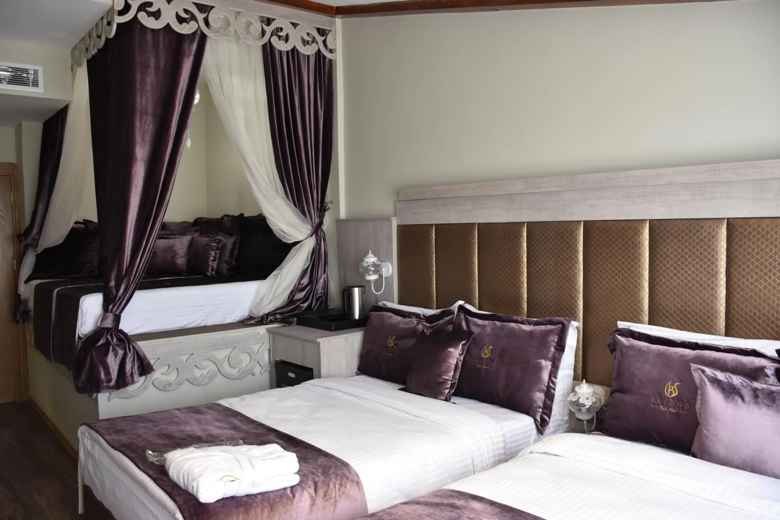 Photo of the whole room, Bed in Bonne Sante Hotel