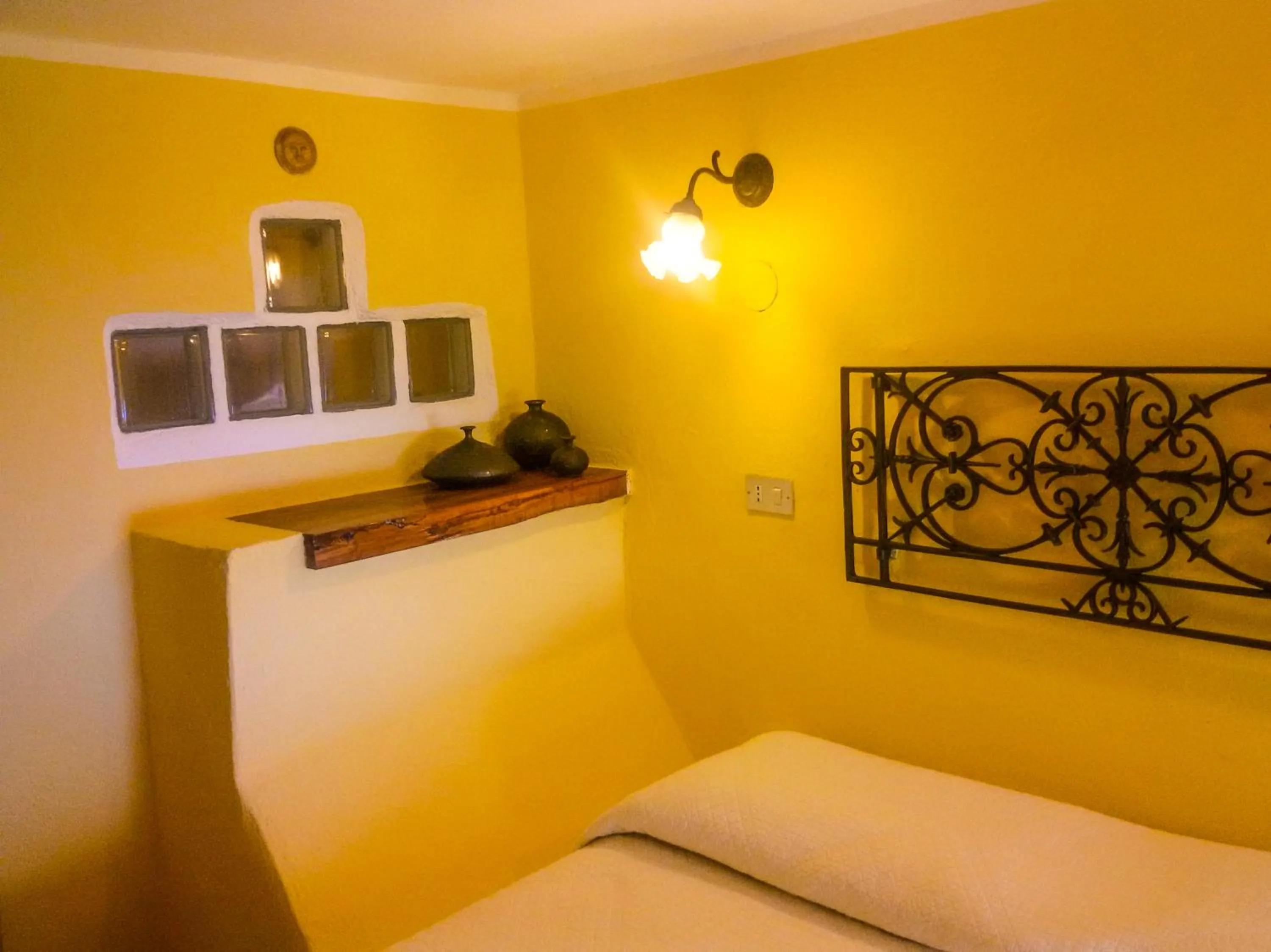 Bed in Marulivo Hotel