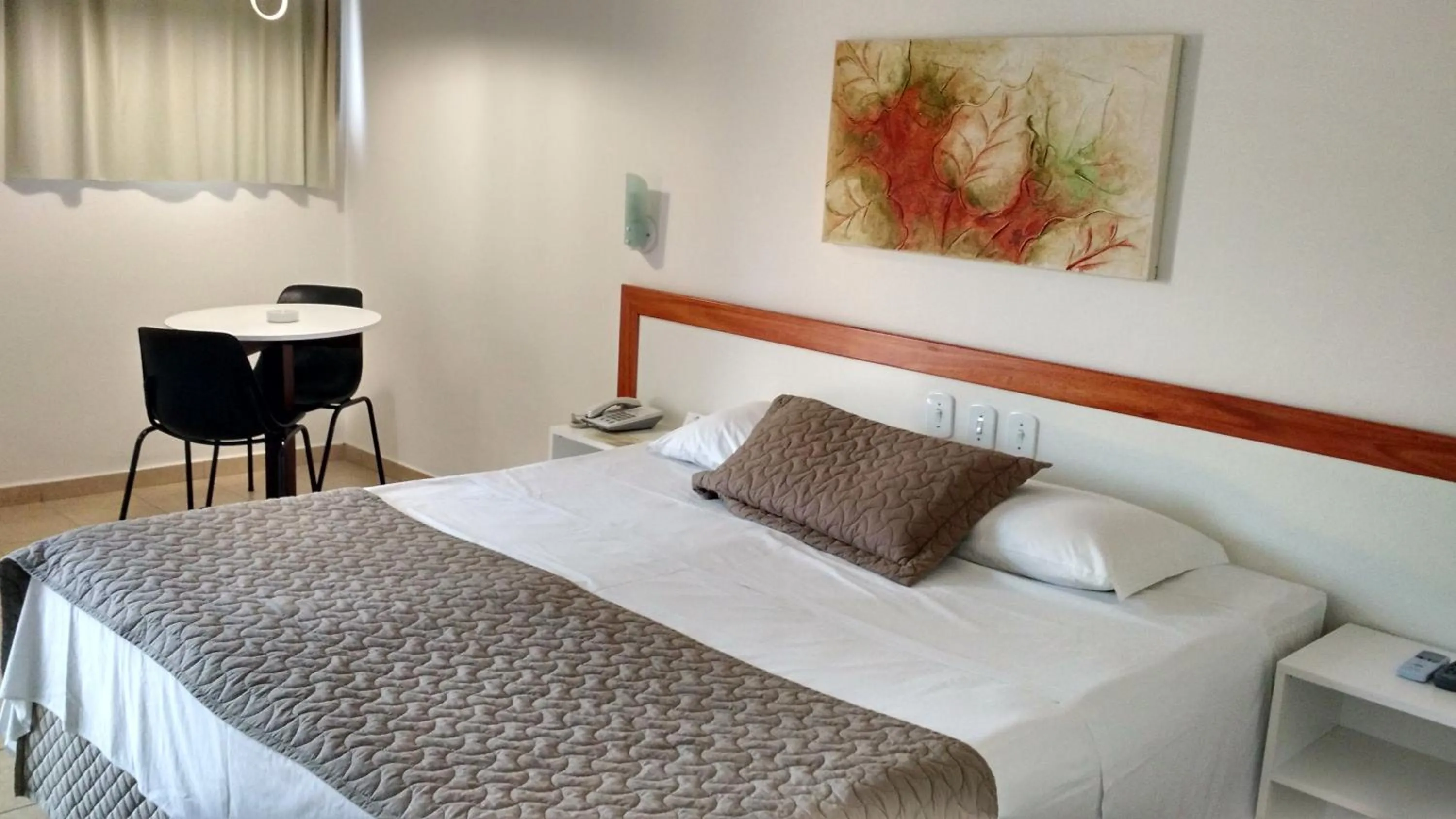 Bed in Hotel Pousada Lord