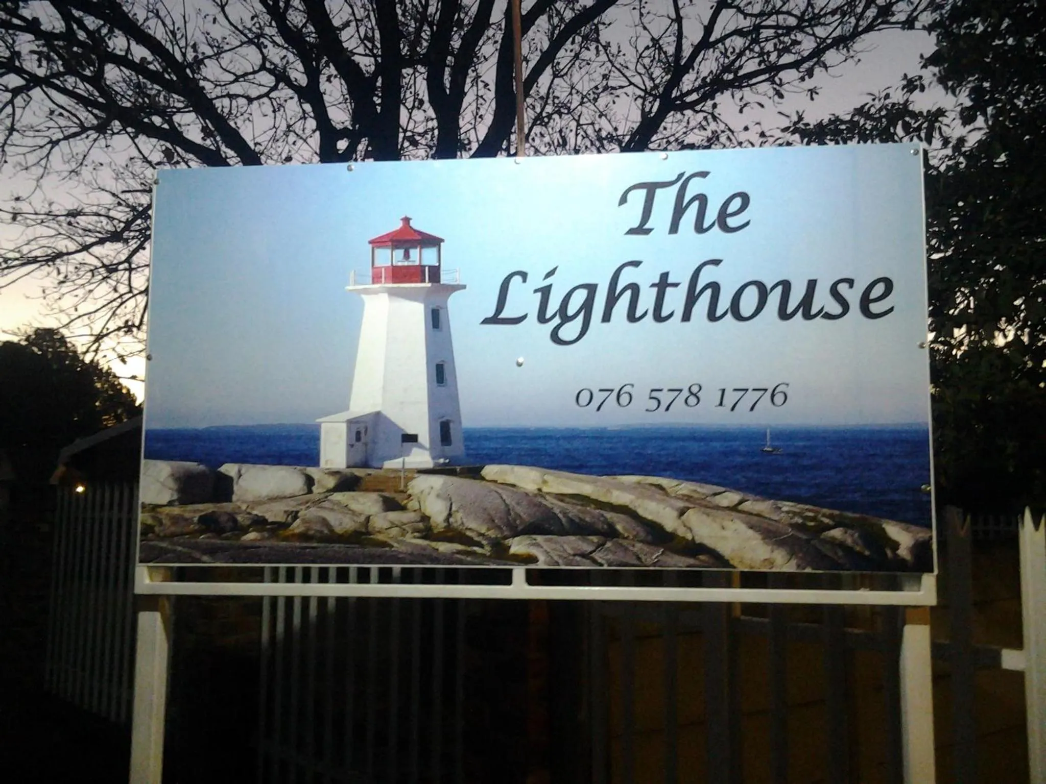 Property logo or sign in The Lighthouse Guesthouse