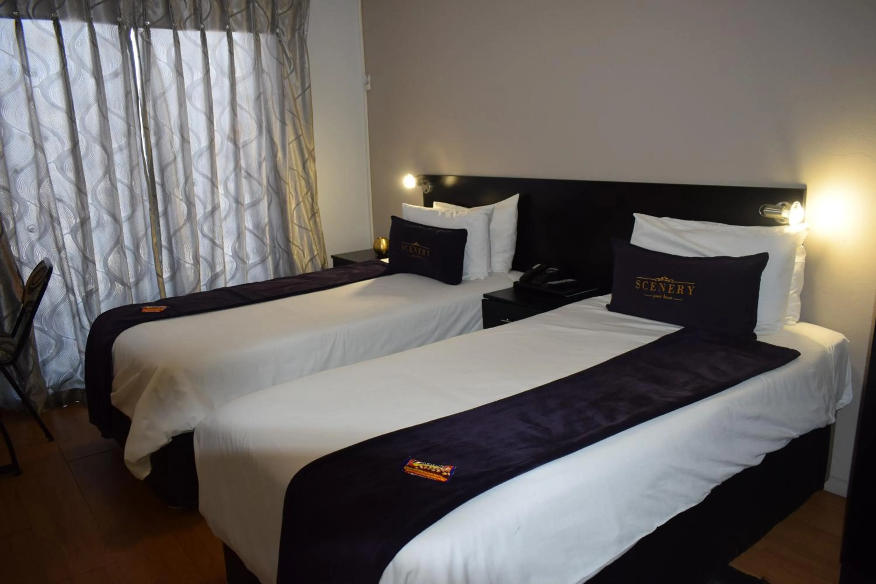 Bed in Scenery Maqalika Guesthouse