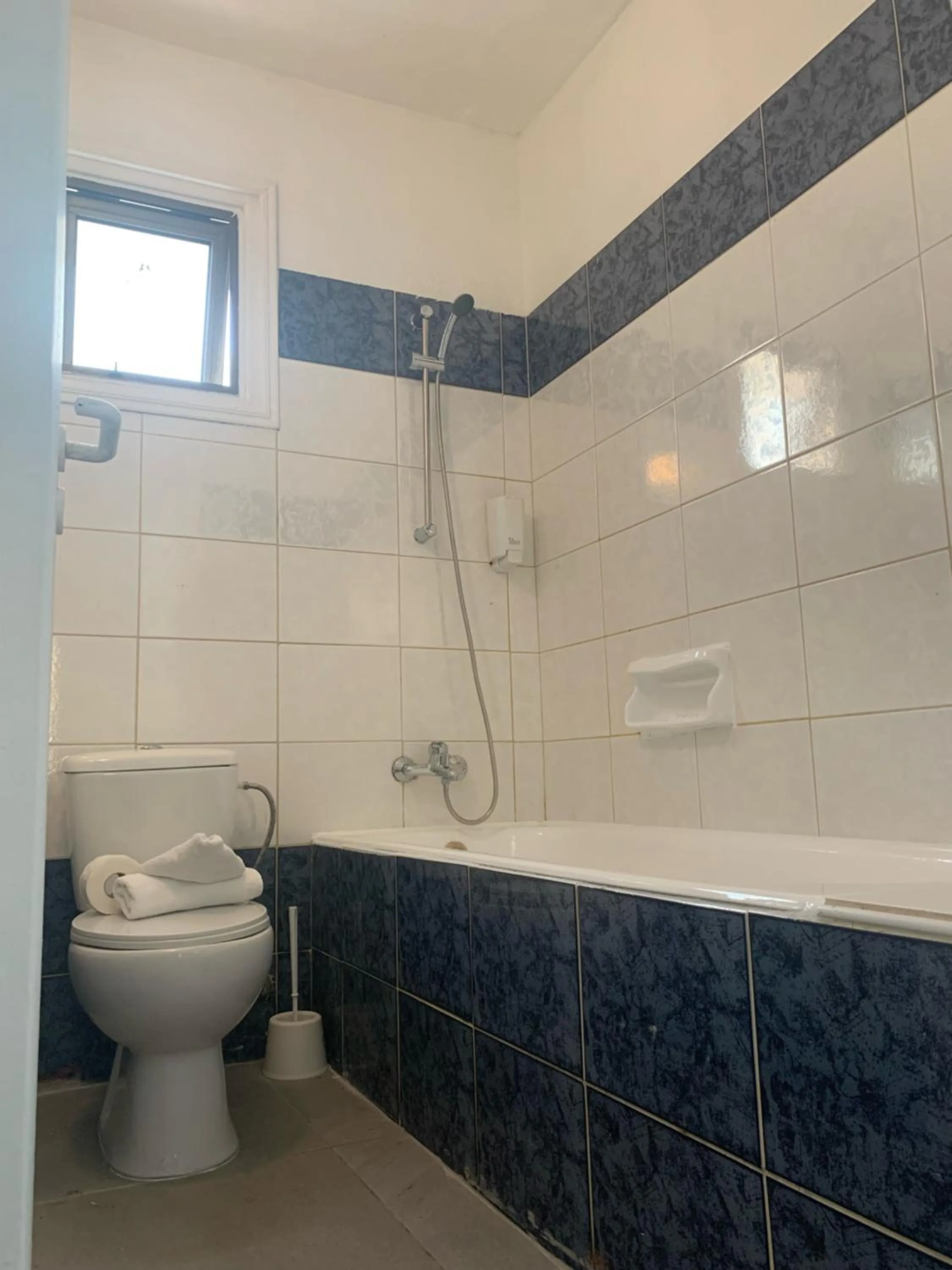 Toilet in Flora Maria Hotel