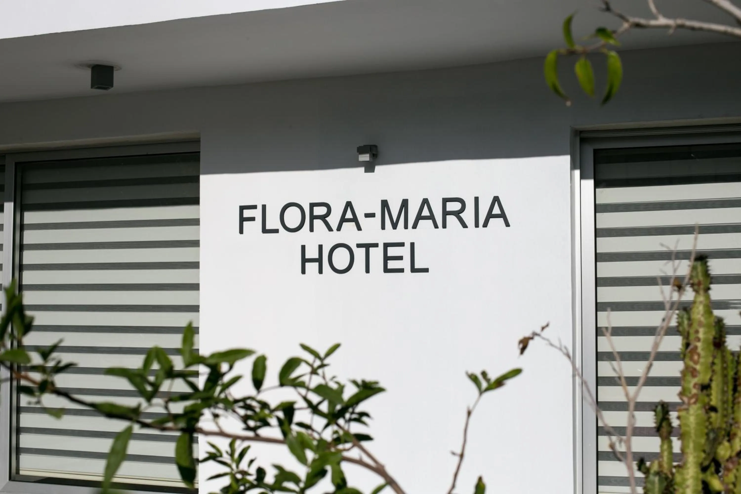 Property logo or sign in Flora Maria Hotel