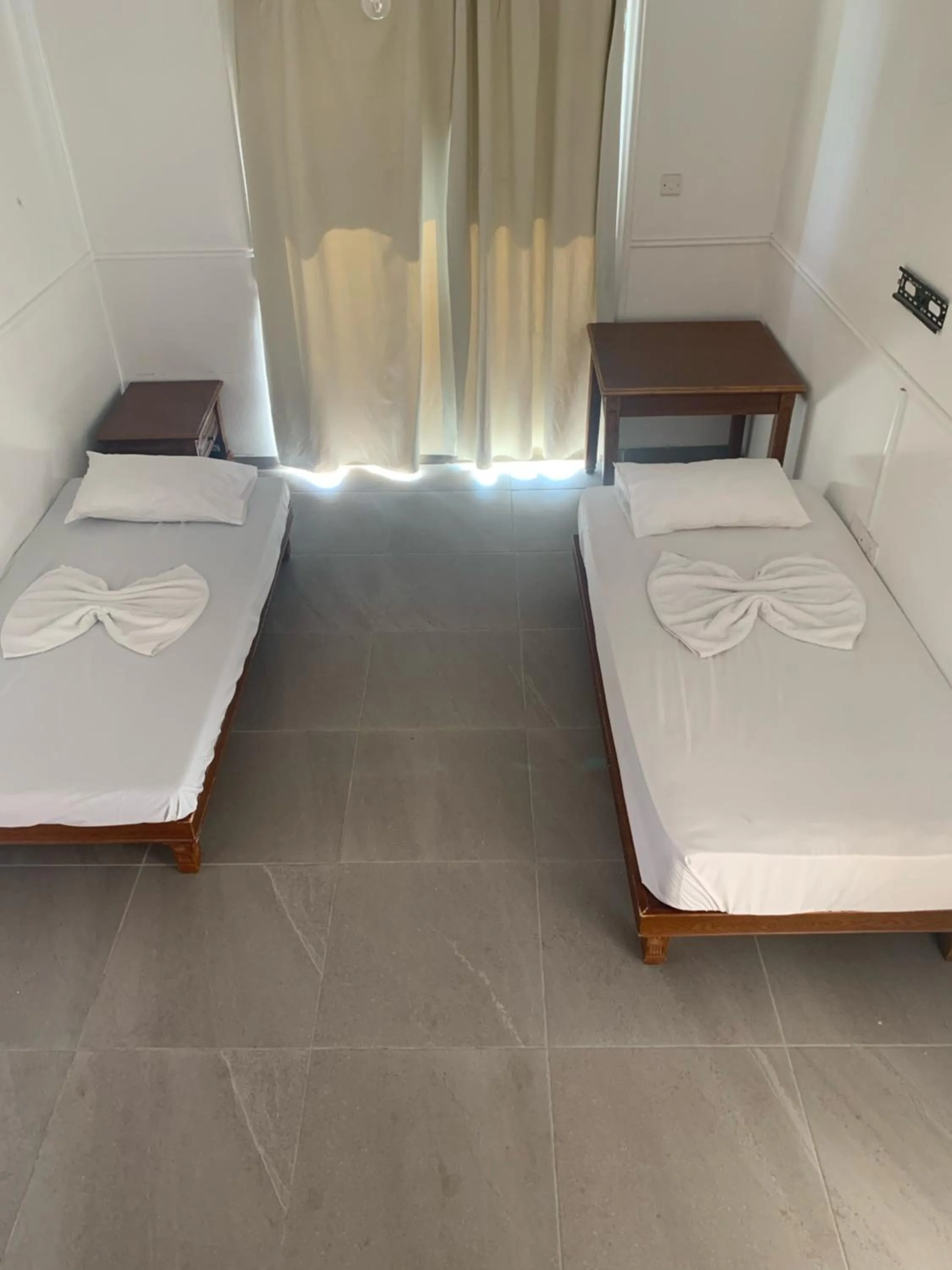 Bed in Flora Maria Hotel