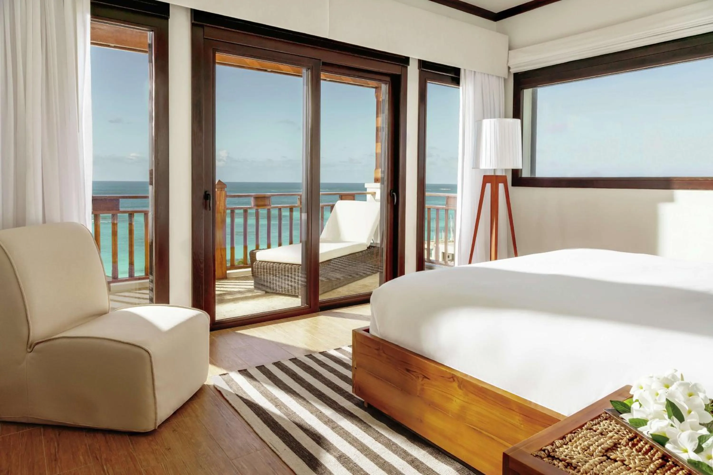 Bed in Zemi Beach House, LXR Hotels & Resorts