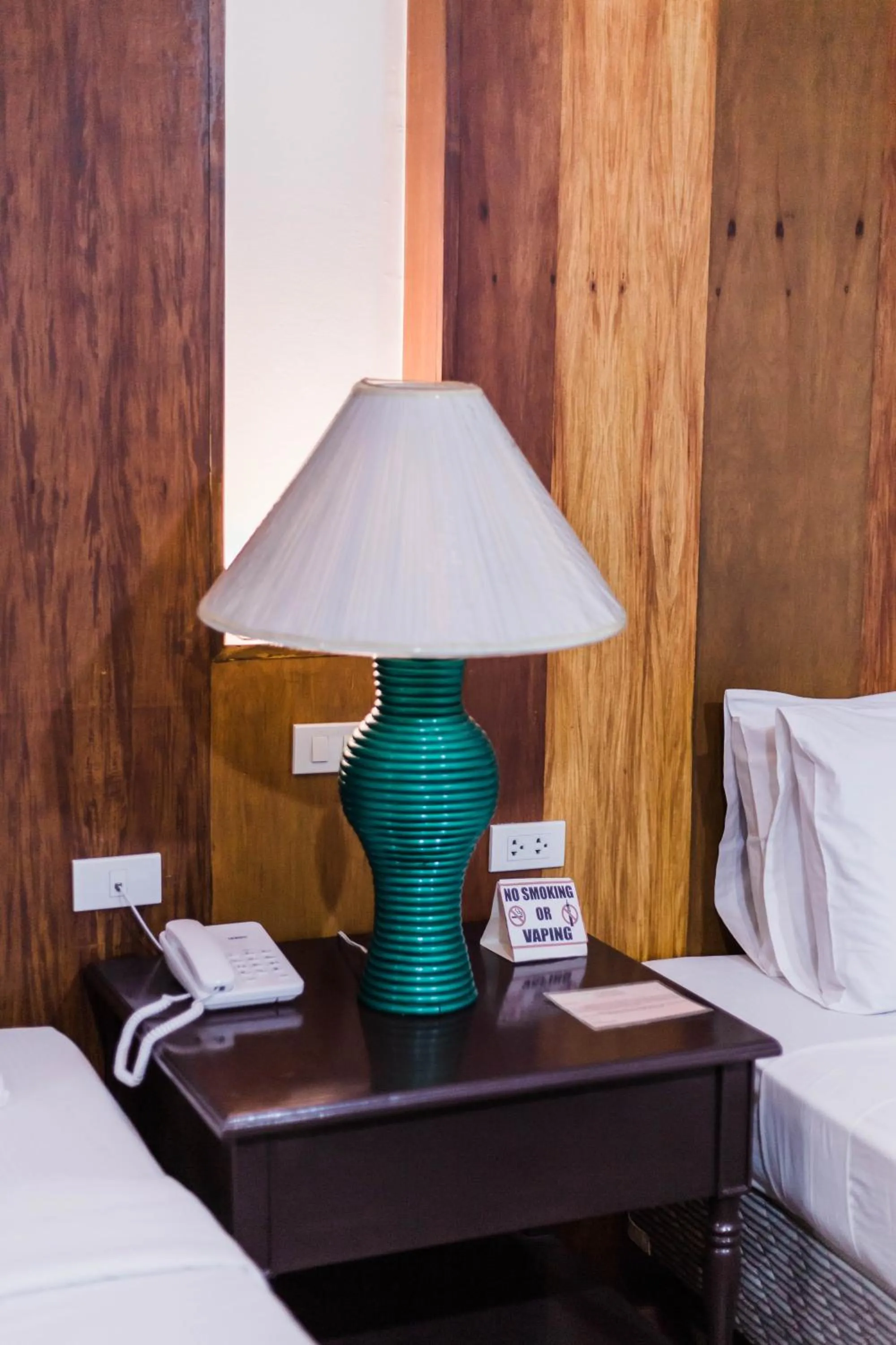 Bed in La Fiesta Hotel