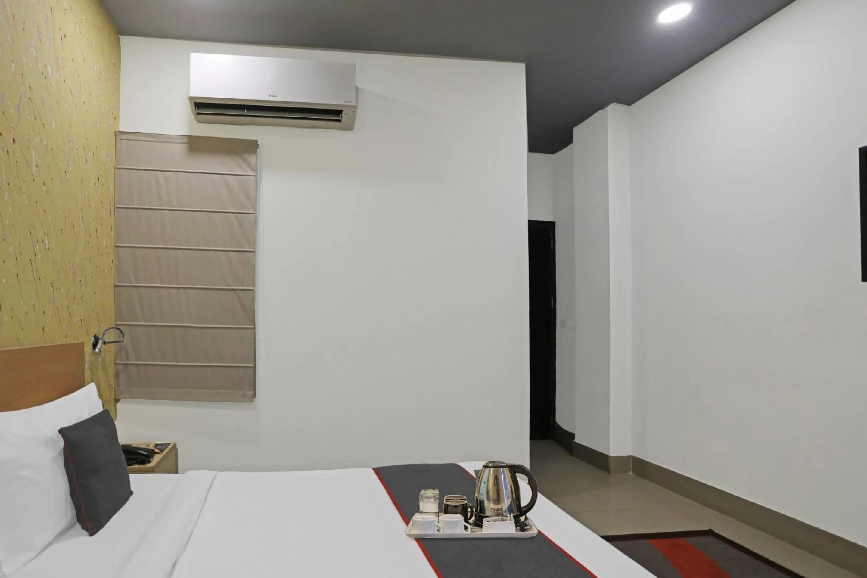 Bed in Super Townhouse Grand Pacific Ocean