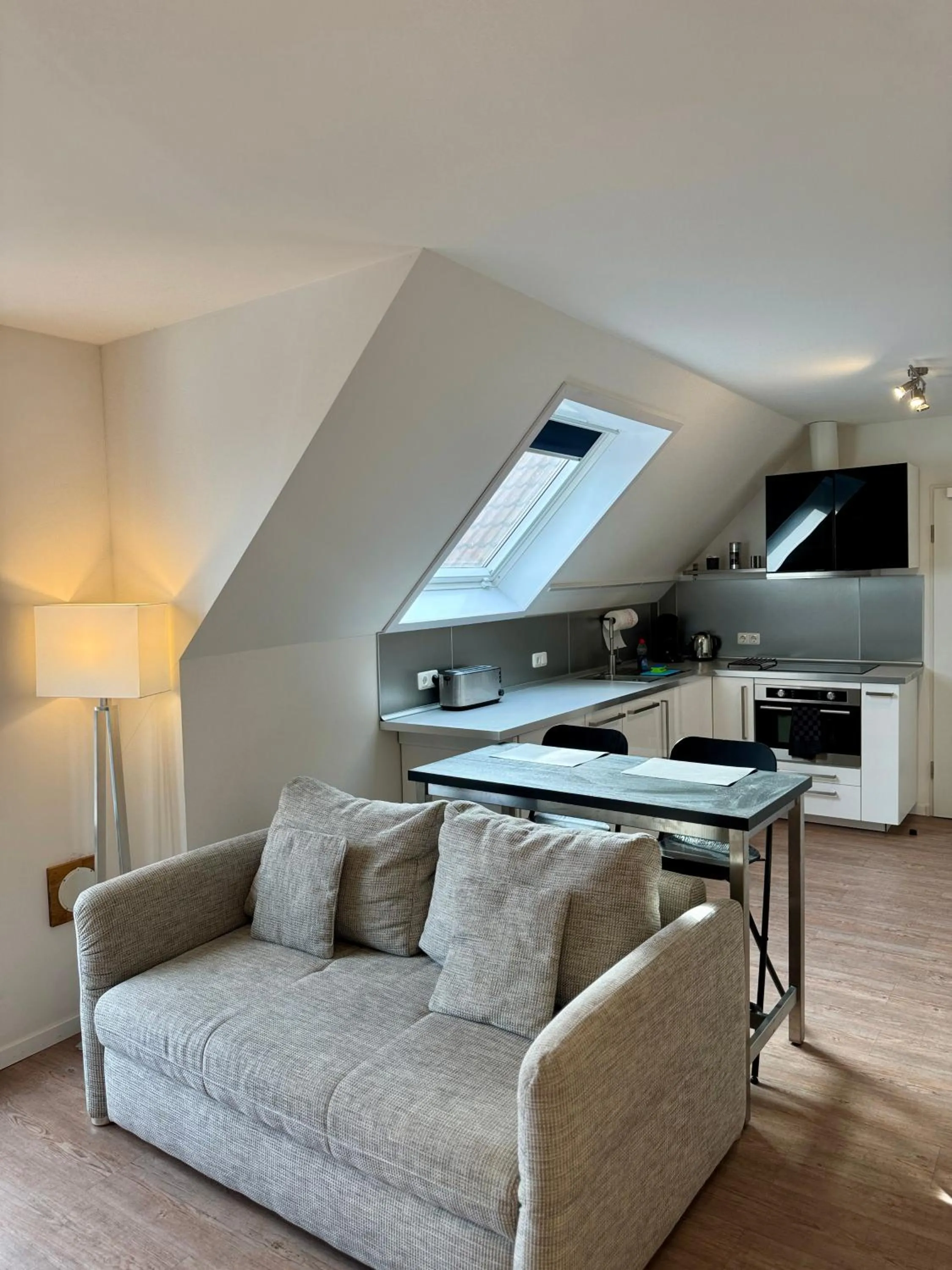 Kitchen or kitchenette in Aparthotel Pumpengasse