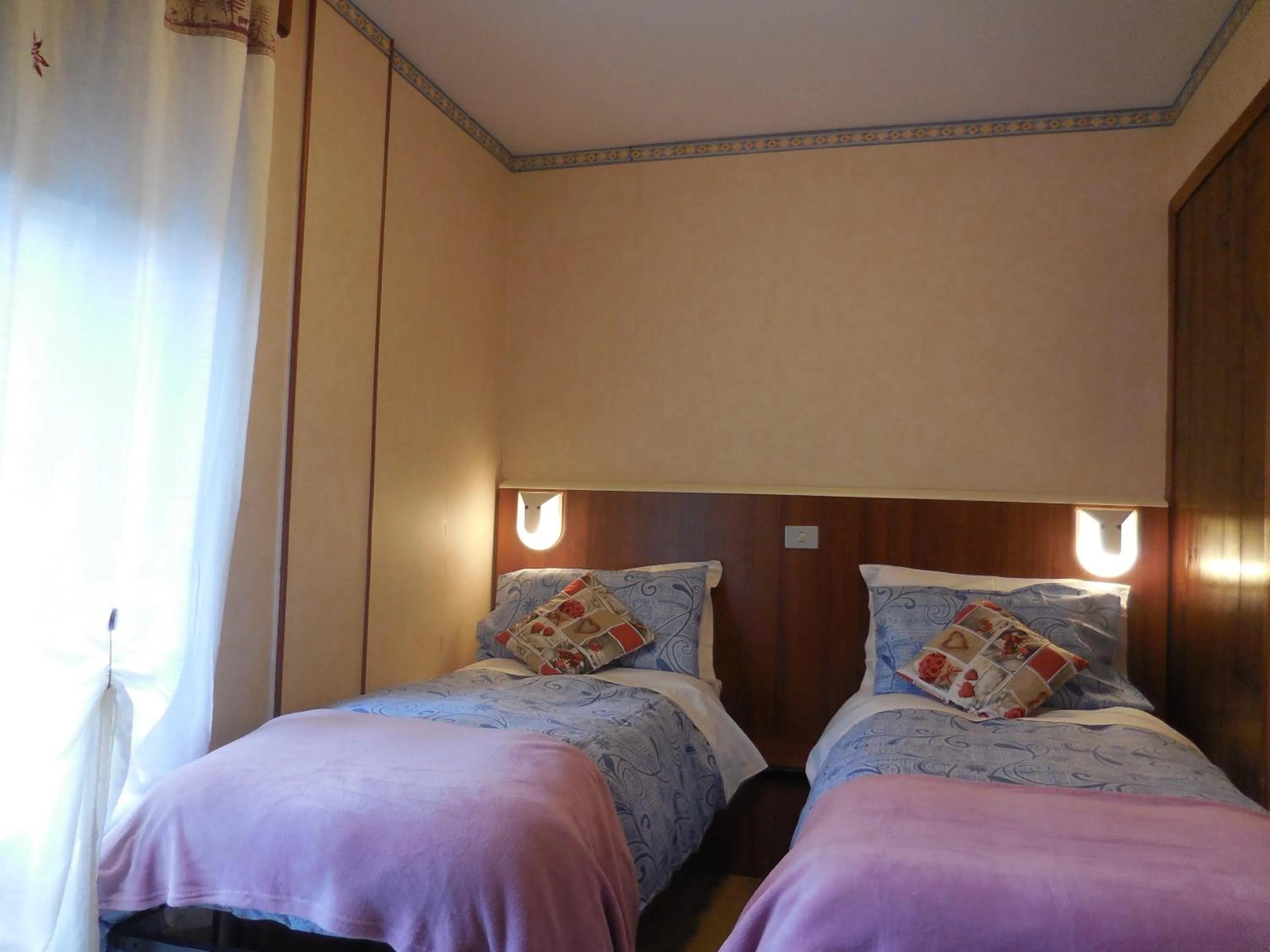 Photo of the whole room, Bed in Pensione Genzianella