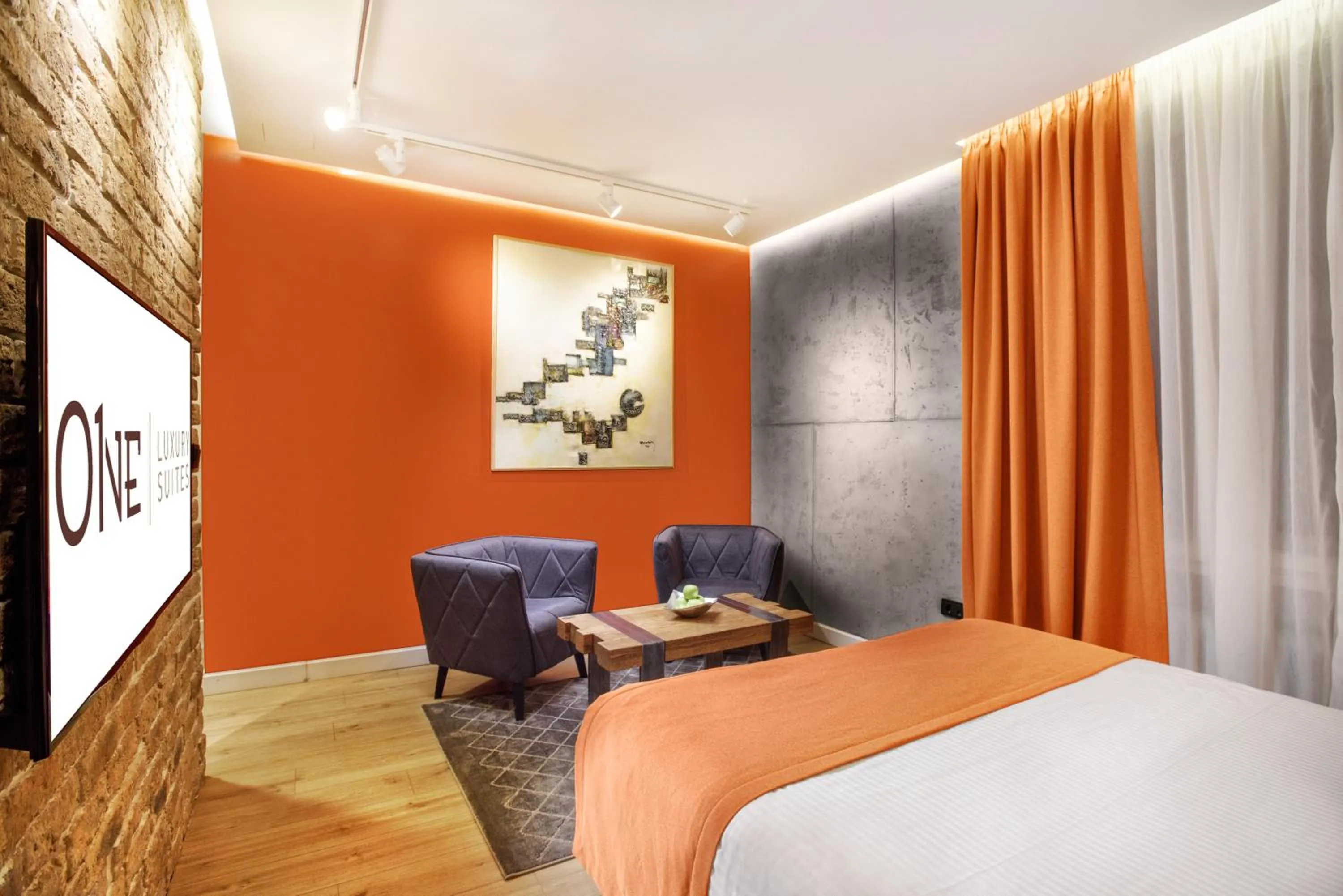 Living room, Bed in One Luxury Suites