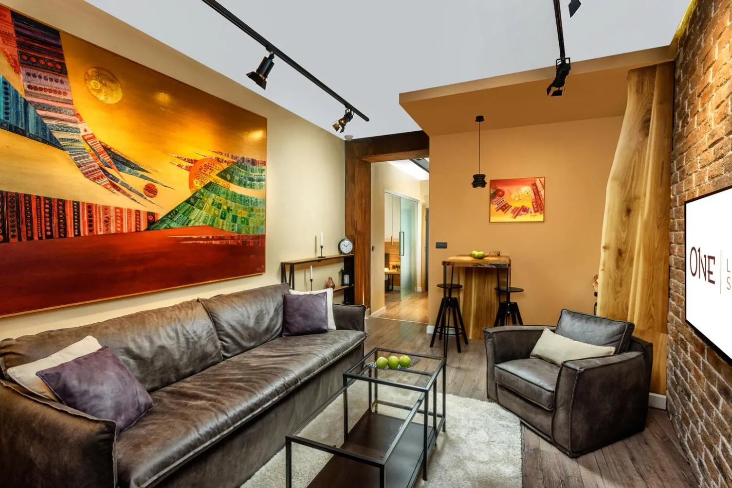 Living room in One Luxury Suites