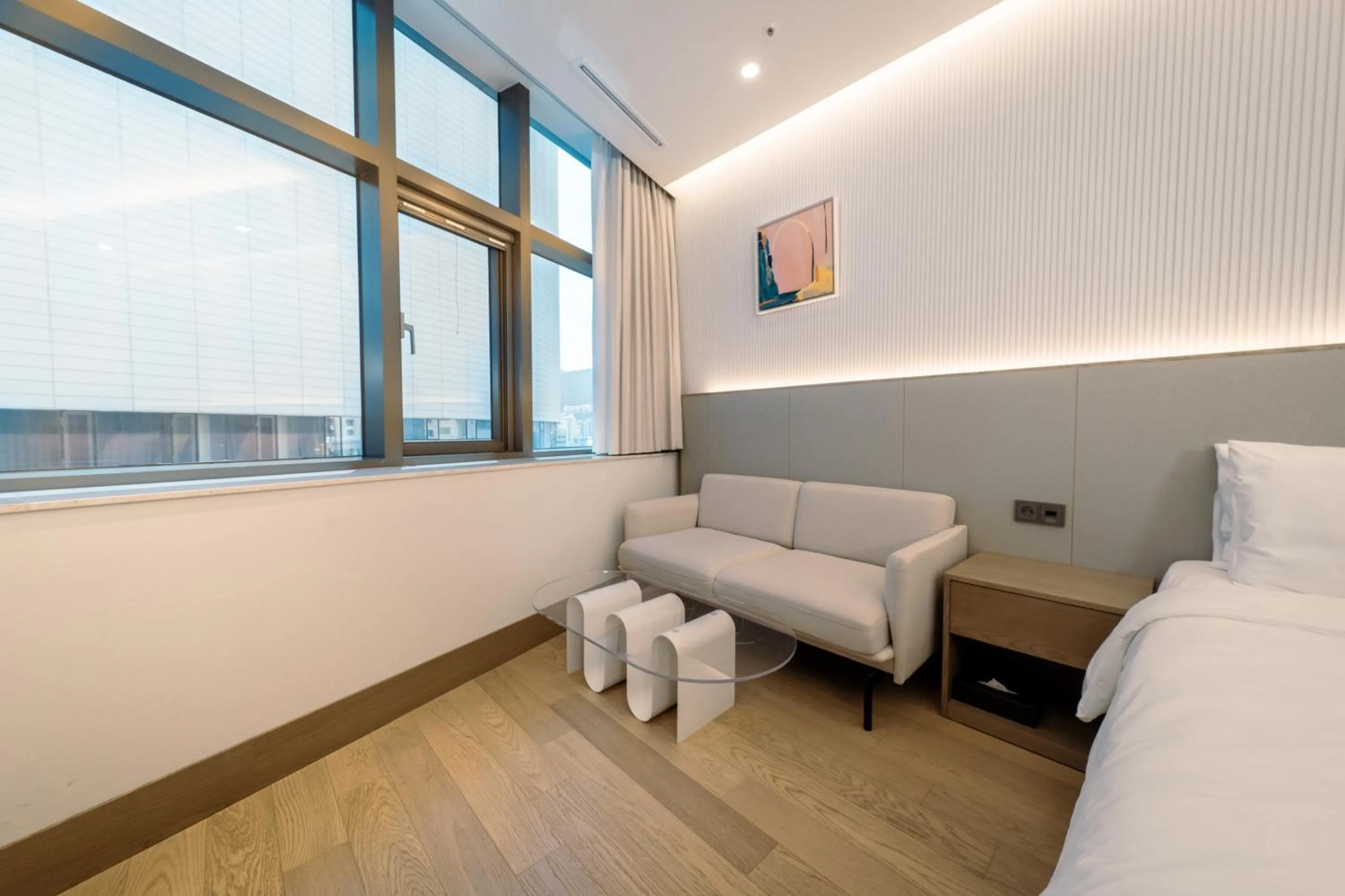 Seating area, Bed in Arban Hotel