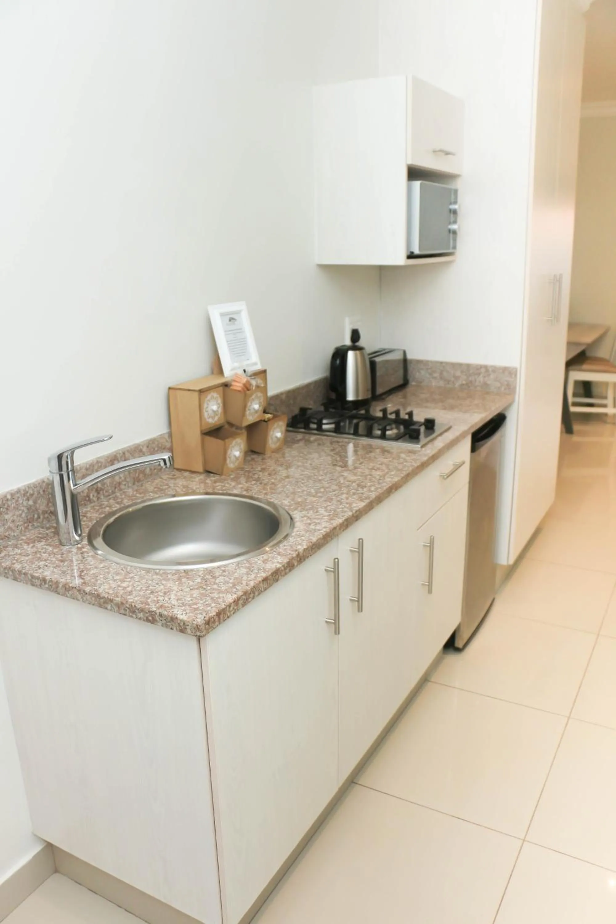 Kitchen or kitchenette in The Milkwood Beach Apartments