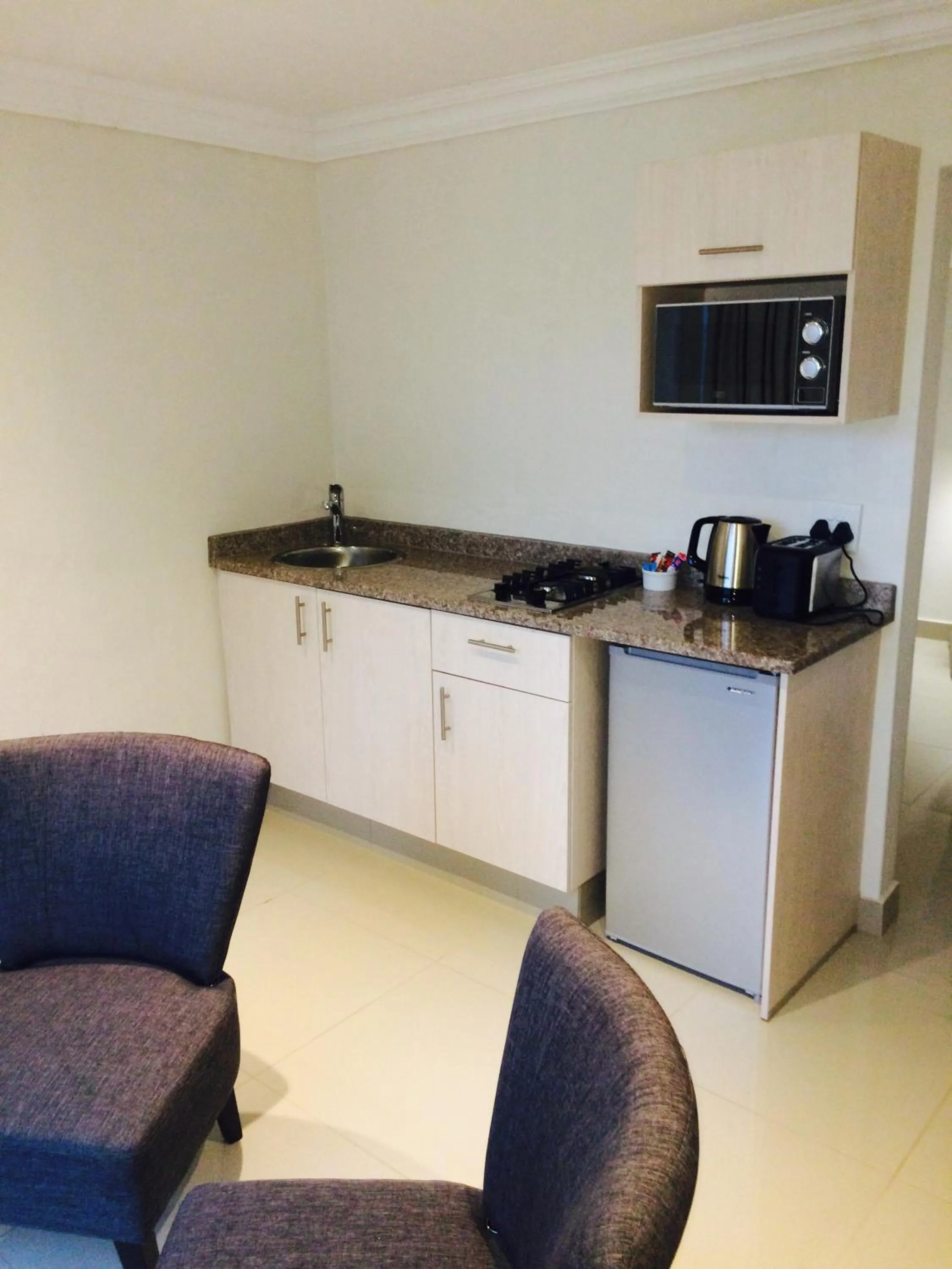 Kitchen or kitchenette in The Milkwood Beach Apartments