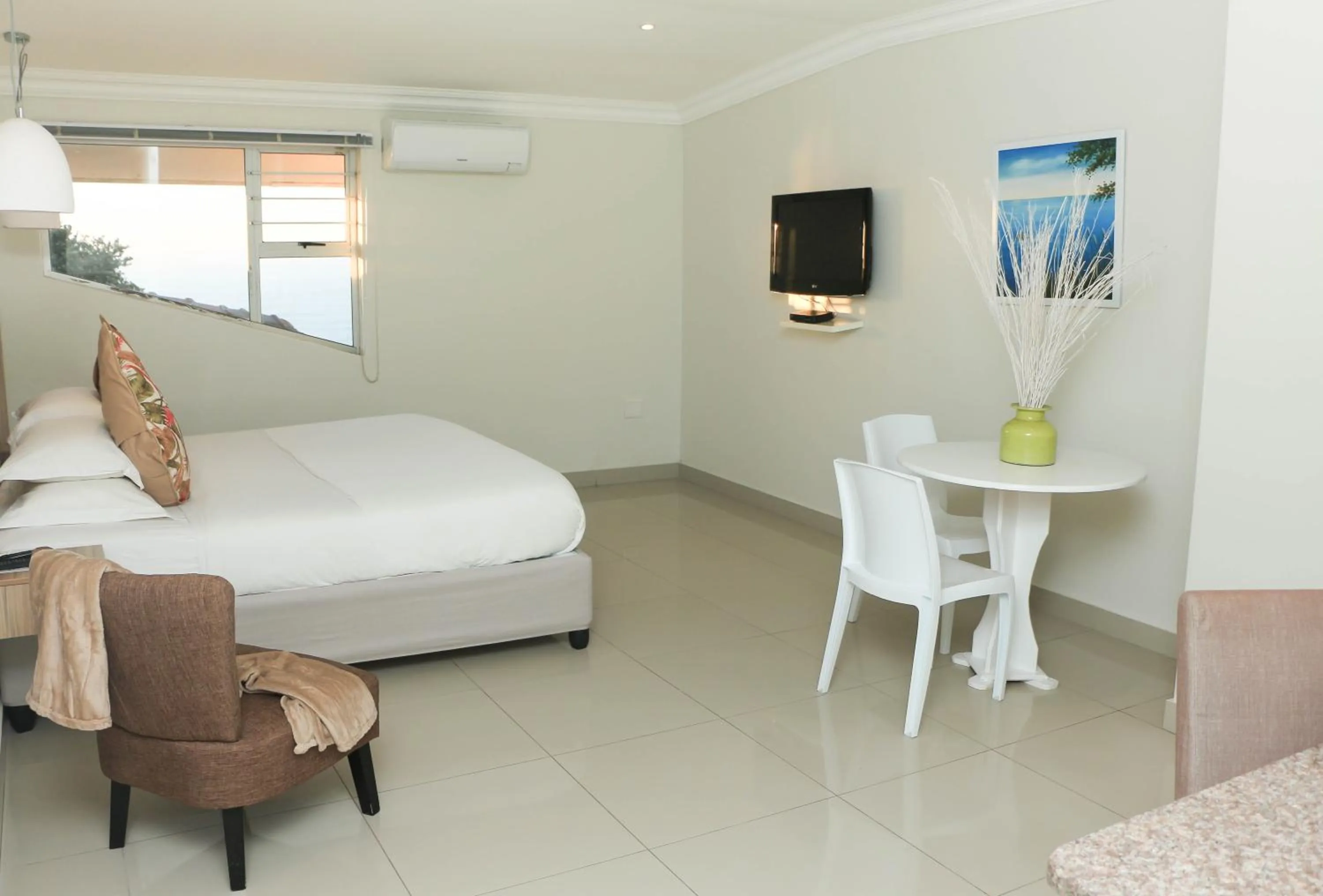 Bed in The Milkwood Beach Apartments
