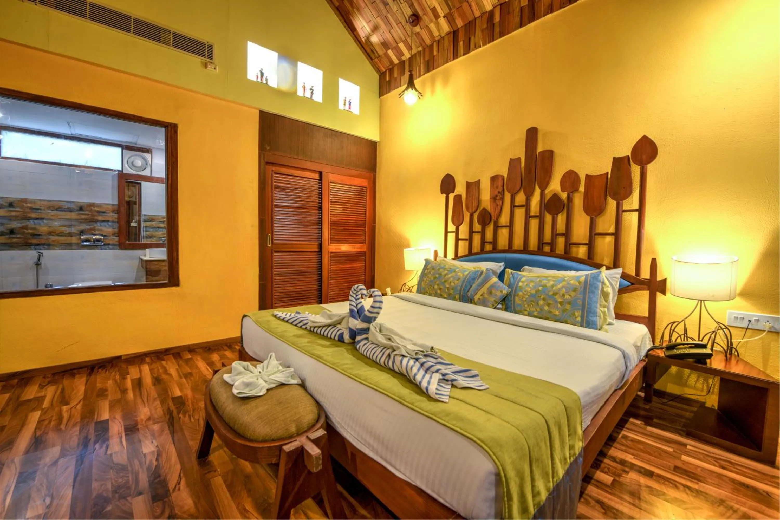 Bed in Silver Sand Beach Resort Neil