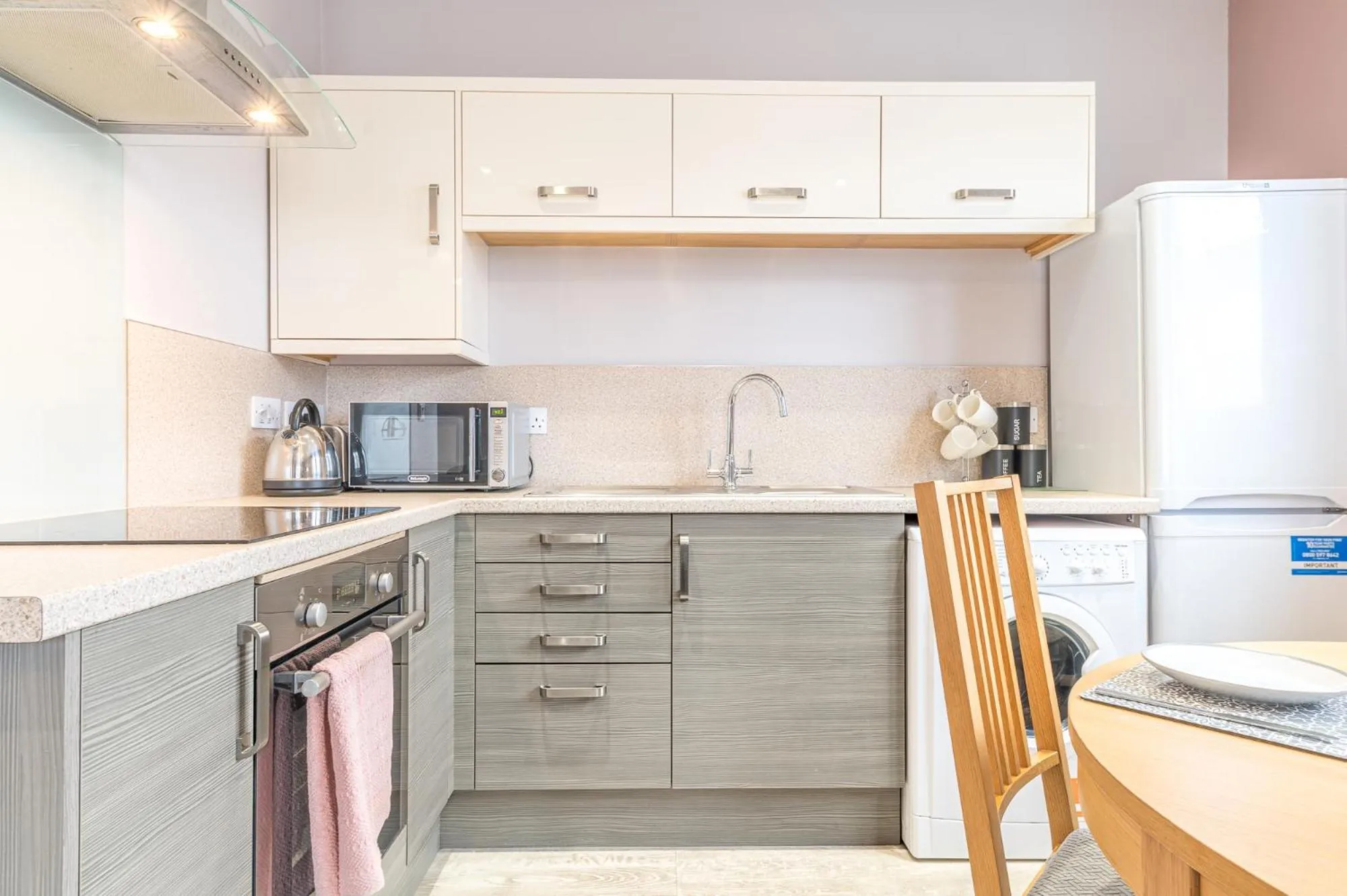 kitchen in Abbey Apartments Modern ApartHotel for Tourists & Professionals