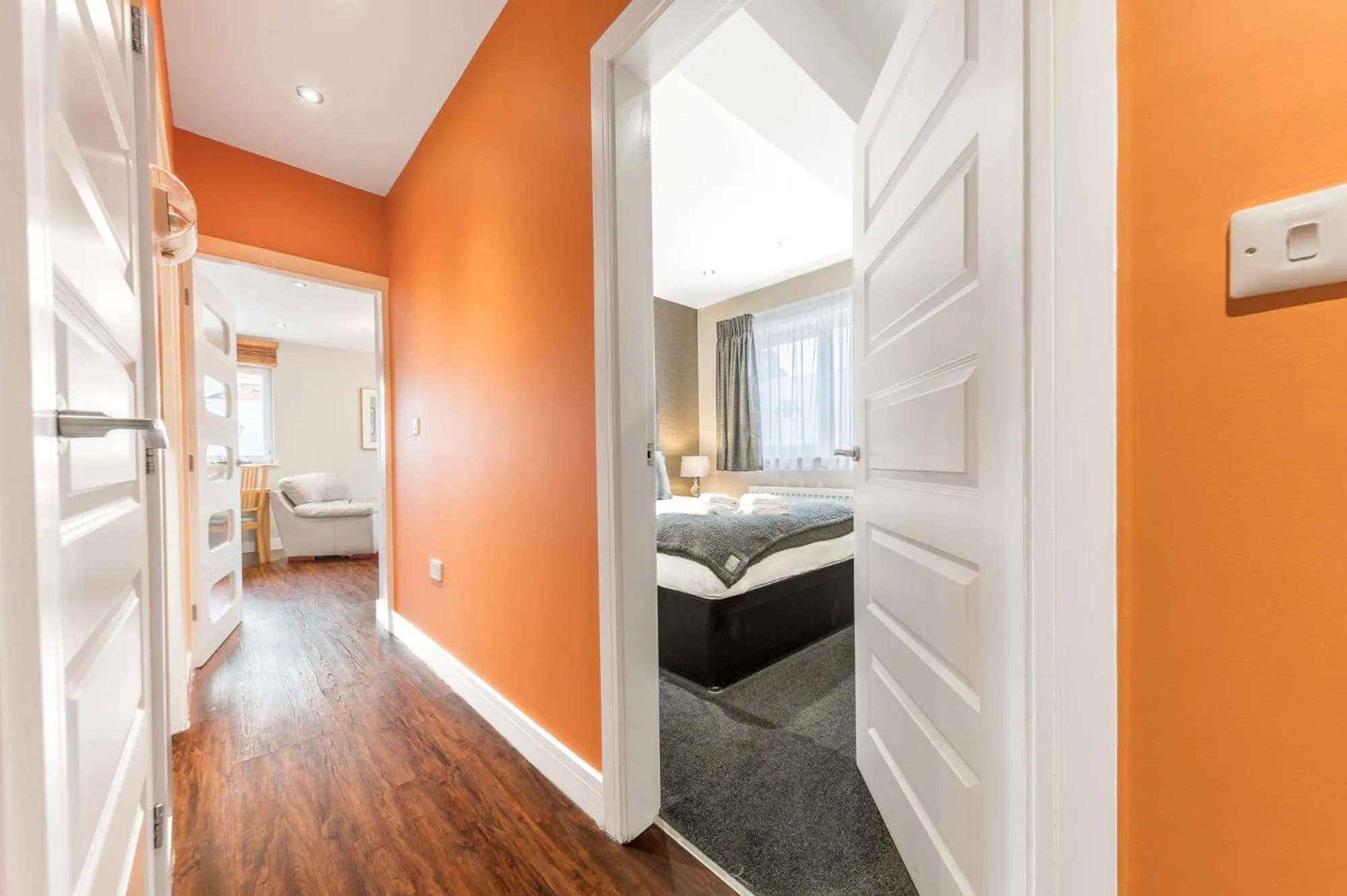 Living room, Bed in Abbey Apartments Modern ApartHotel for Tourists & Professionals