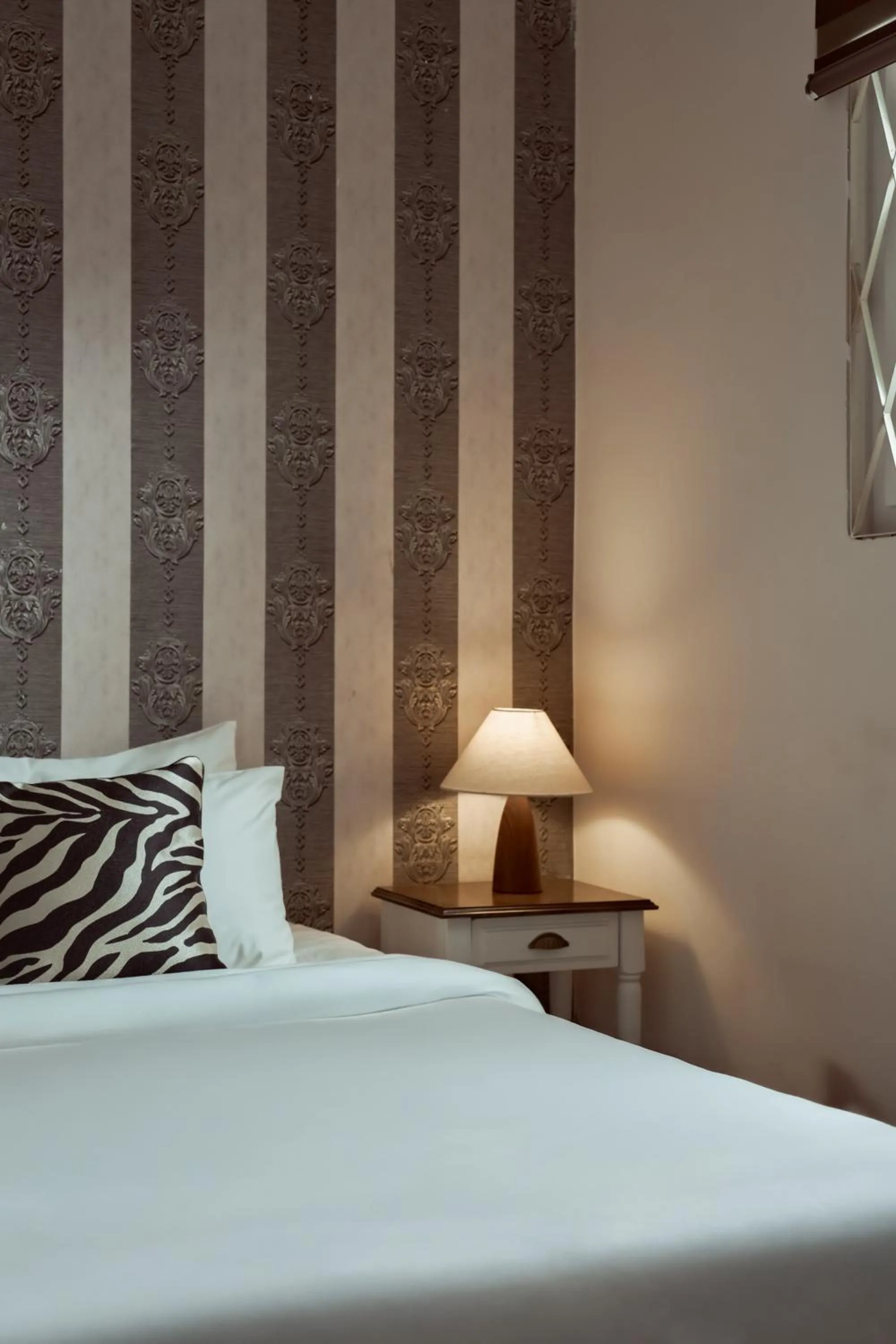 Bed in The One Ben Thanh Hotel-City Center