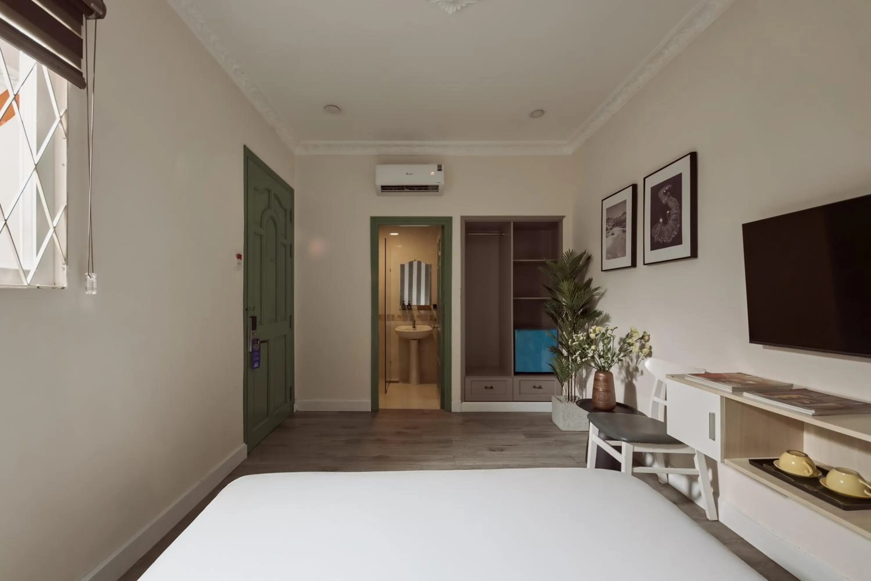 Photo of the whole room, Bed in The One Ben Thanh Hotel-City Center