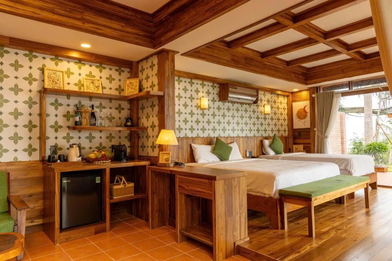 Photo of the whole room, Bed in Rocks Beach Boutique