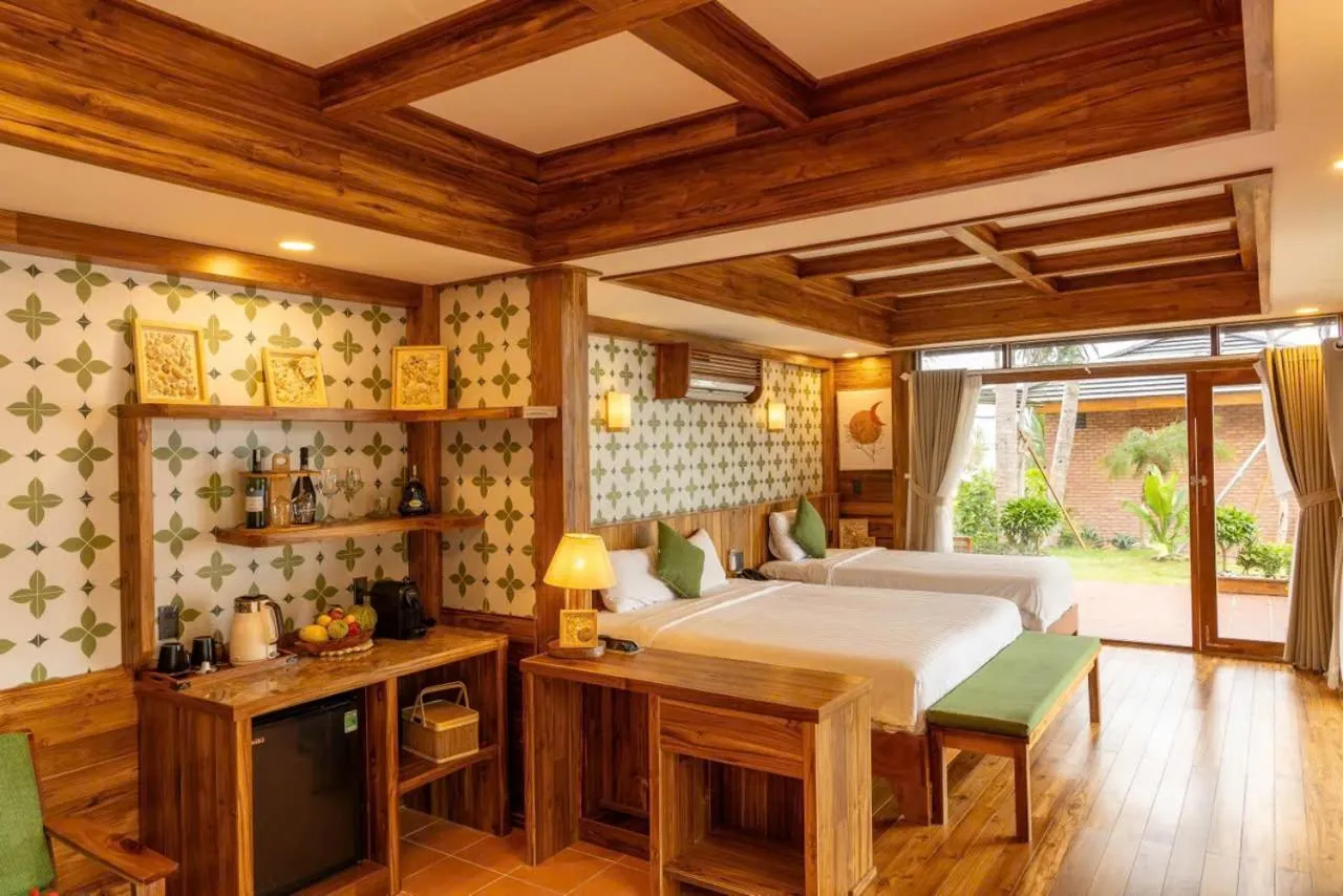 Photo of the whole room, Bed in Rocks Beach Boutique