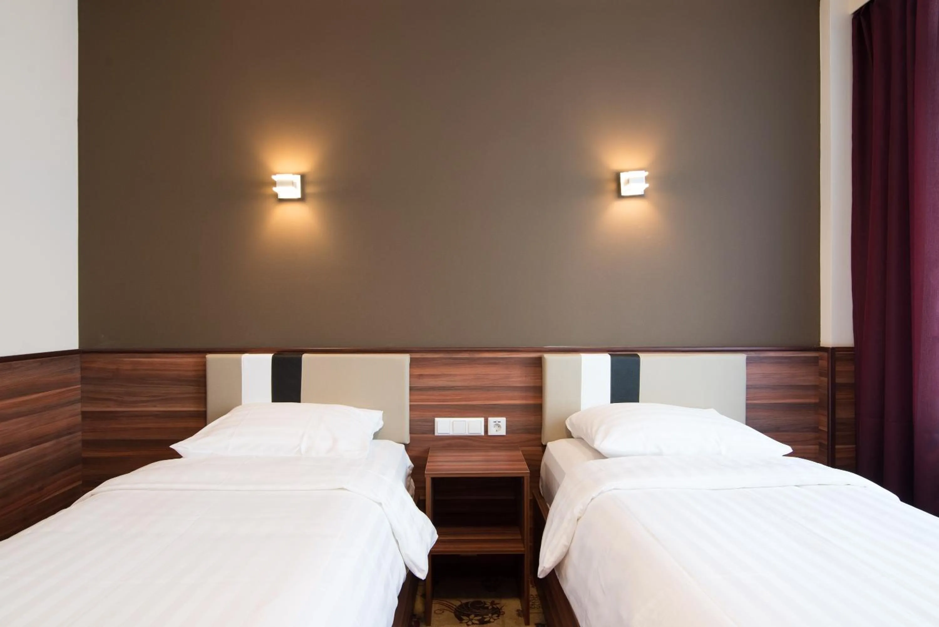 Bed in Hotel King's Court