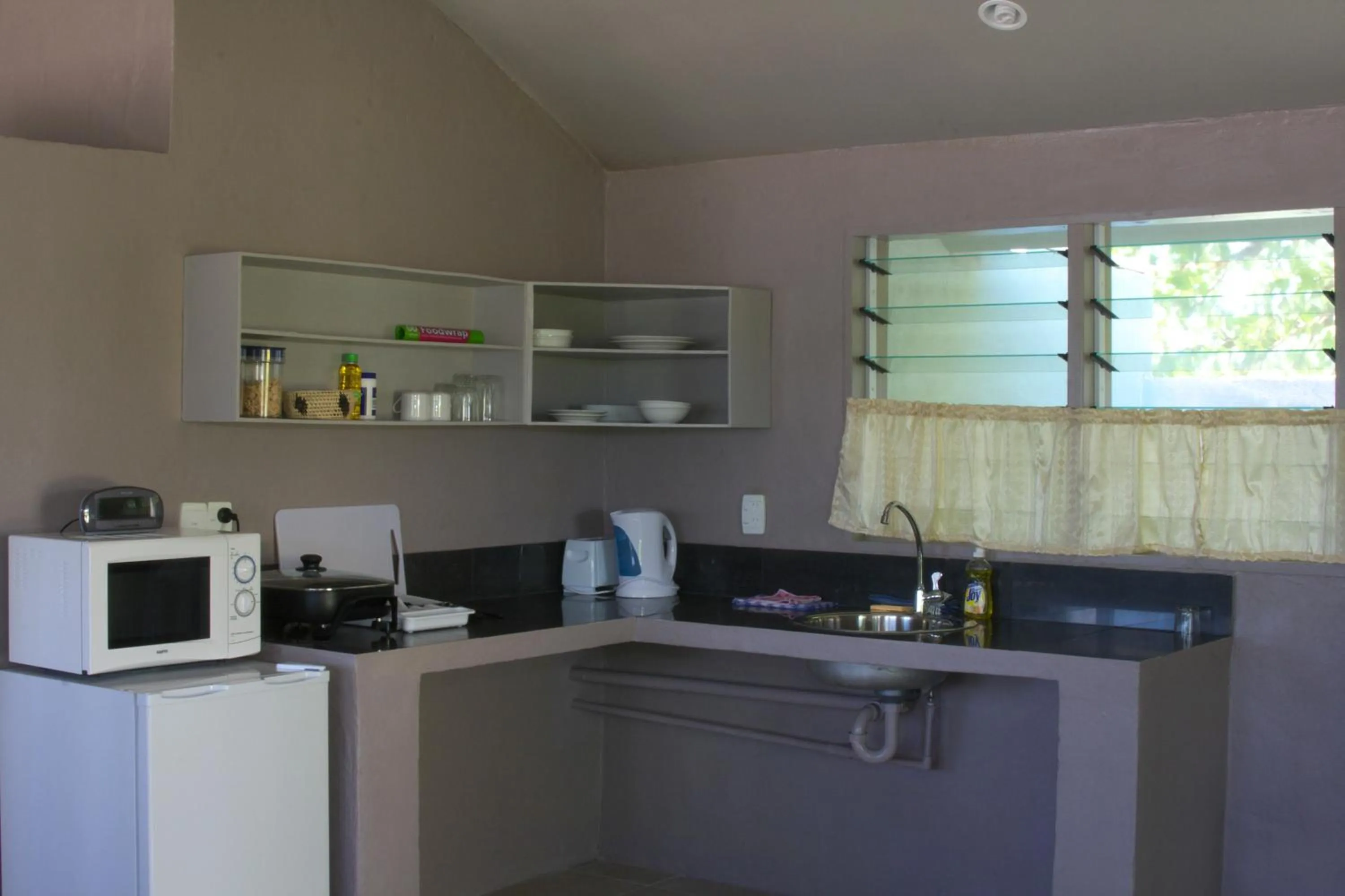 Kitchen or kitchenette in Savaii Lagoon Resort