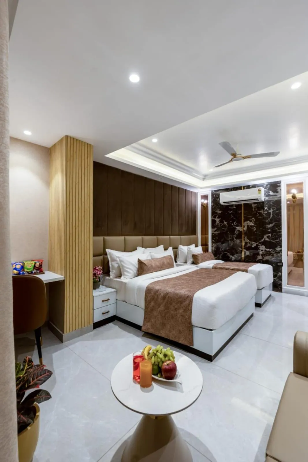 Photo of the whole room, Bed in Hotel Aroma Suites Delhi Airport
