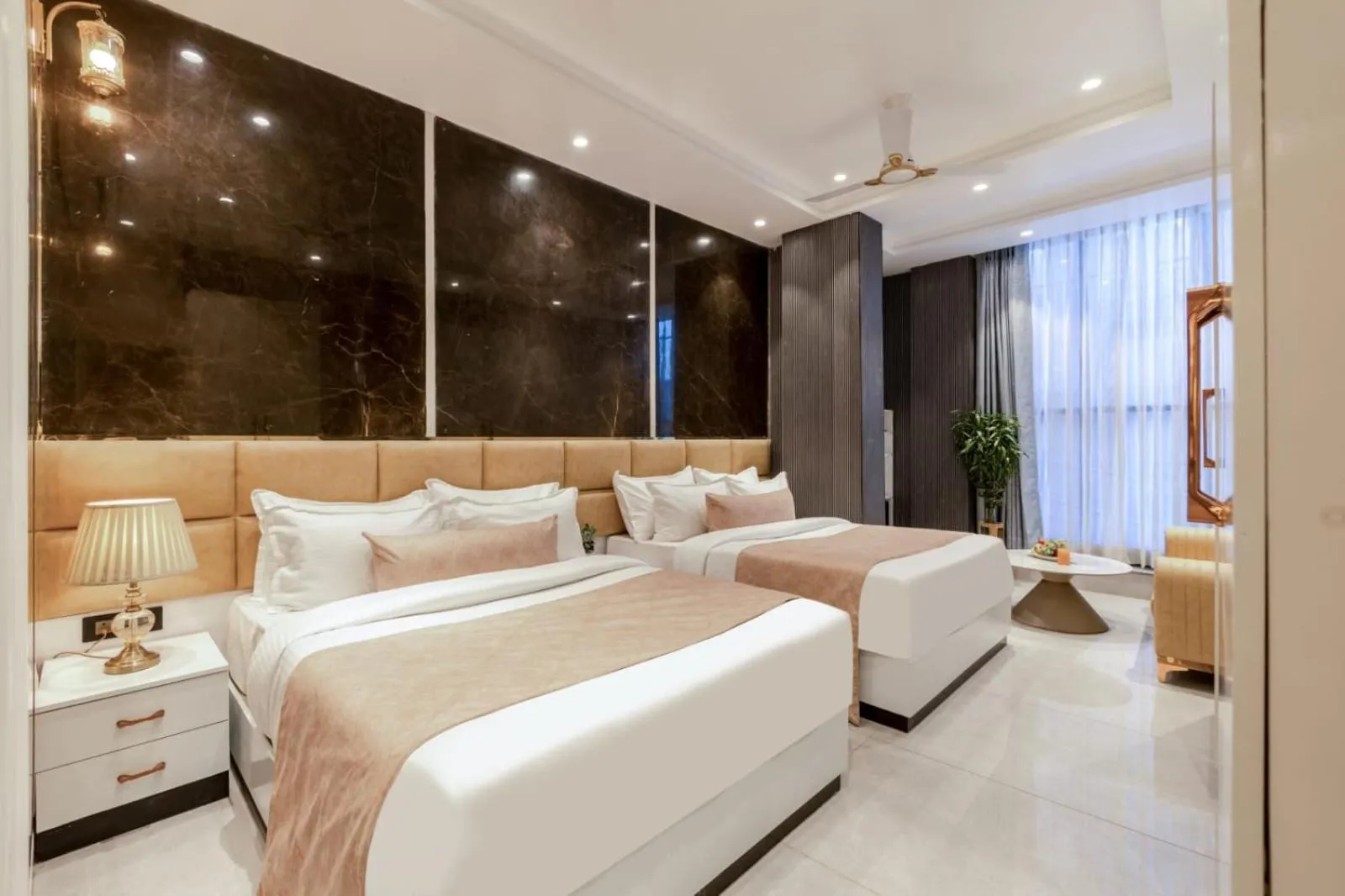 Photo of the whole room, Bed in Hotel Aroma Suites Delhi Airport