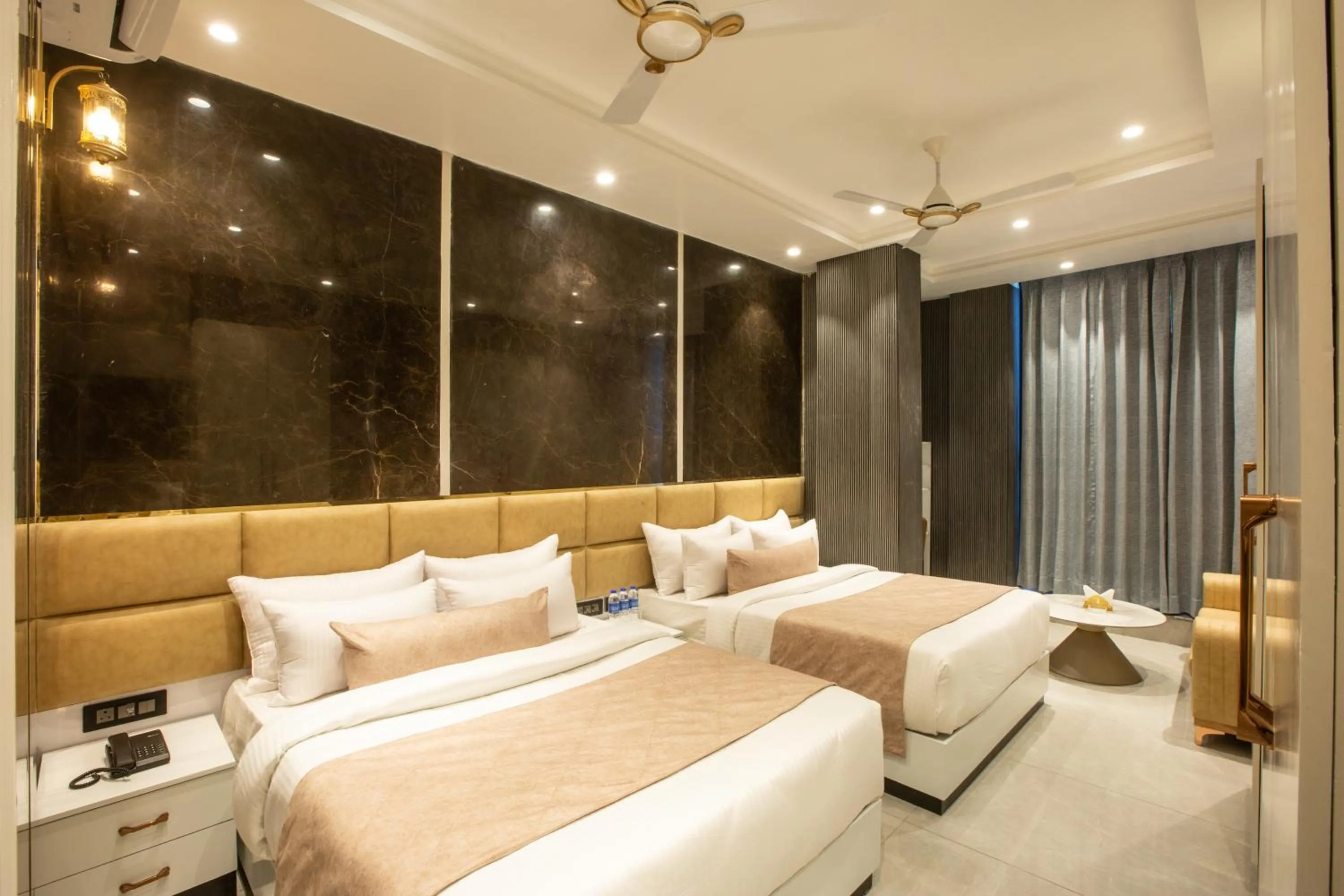 Photo of the whole room, Bed in Hotel Aroma Suites Delhi Airport