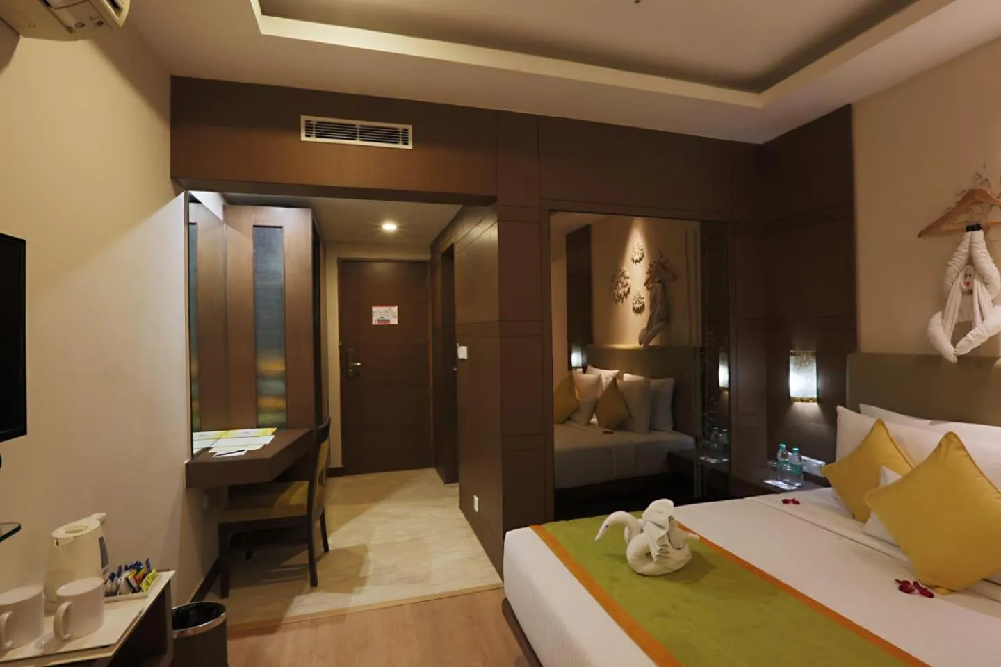 Photo of the whole room, Bed in Hotel Aroma Suites Delhi Airport