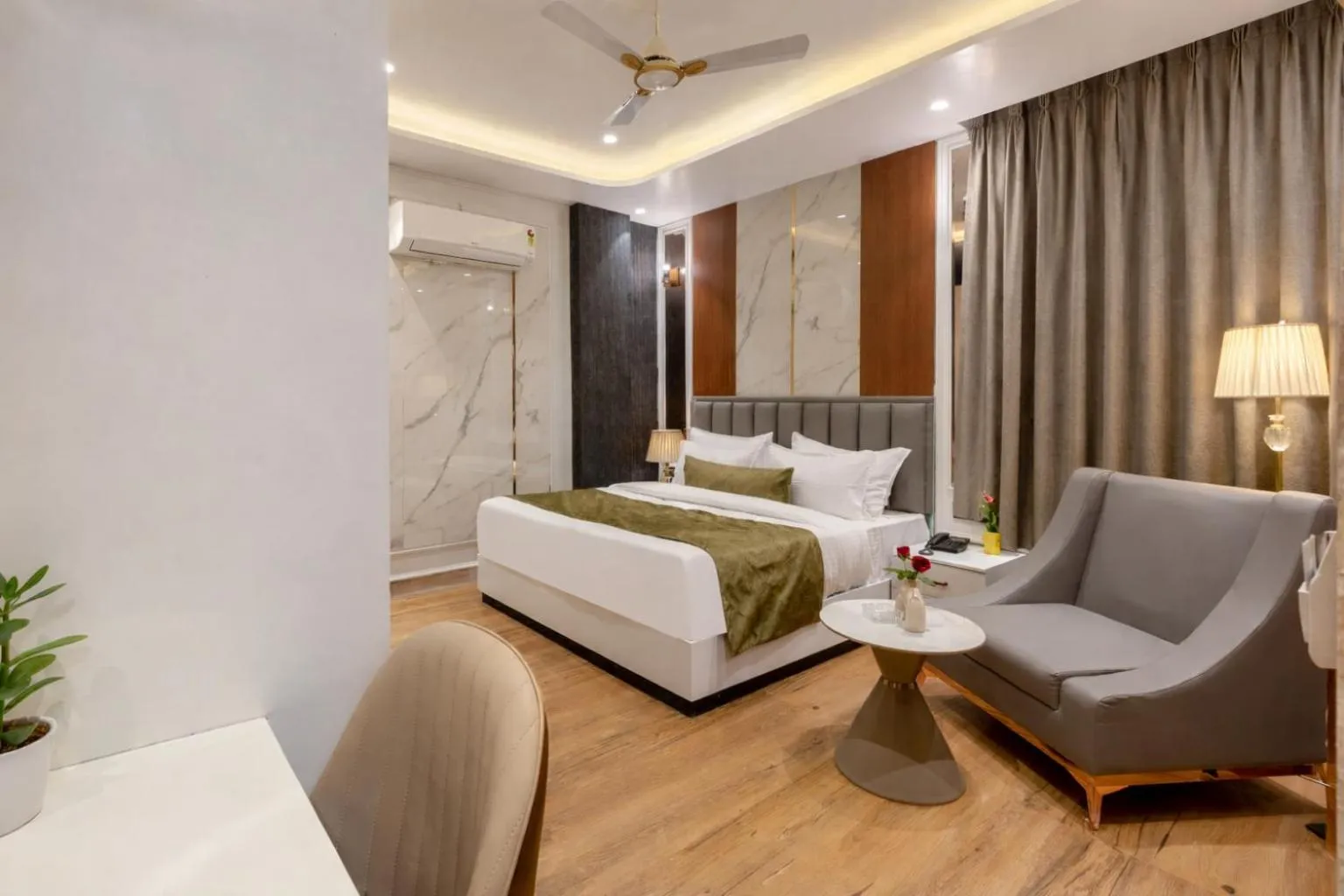 Photo of the whole room, Bed in Hotel Aroma Suites Delhi Airport